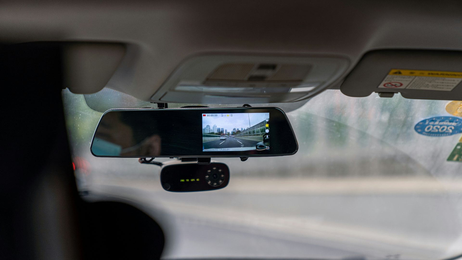 car side mirror with water droplets