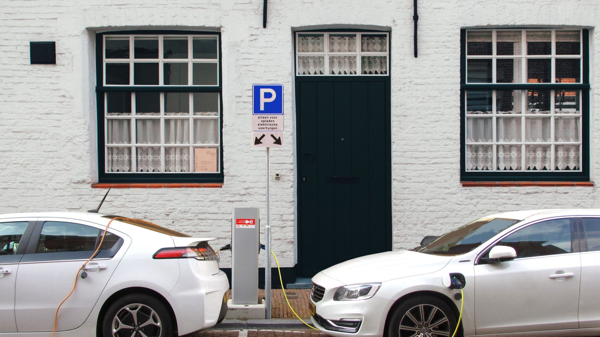500px provided description: ... [#automotive ,#street ,#car ,#sidewalk ,#cityscape ,#road ,#roadside ,#environment ,#parking lot ,#driveway ,#charging ,#motor vehicle ,#electric car ,#charging station ,#less emission]
