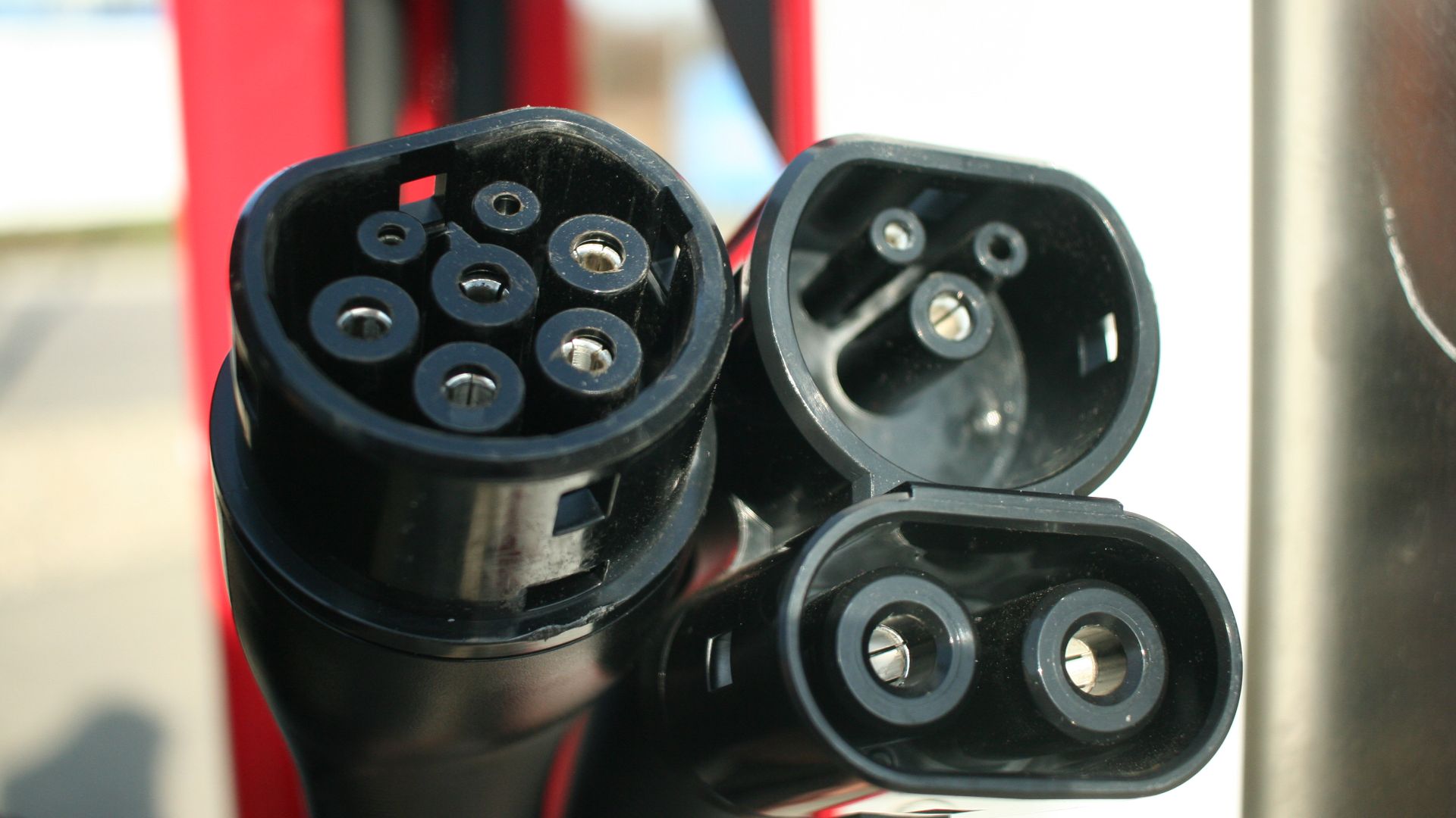 Dual cable Tesla Supercharger for electric vehicle charging at up to 120 kW.  IEC Type 2 outlet with Model S/X-only notch (originally specified for unprotected