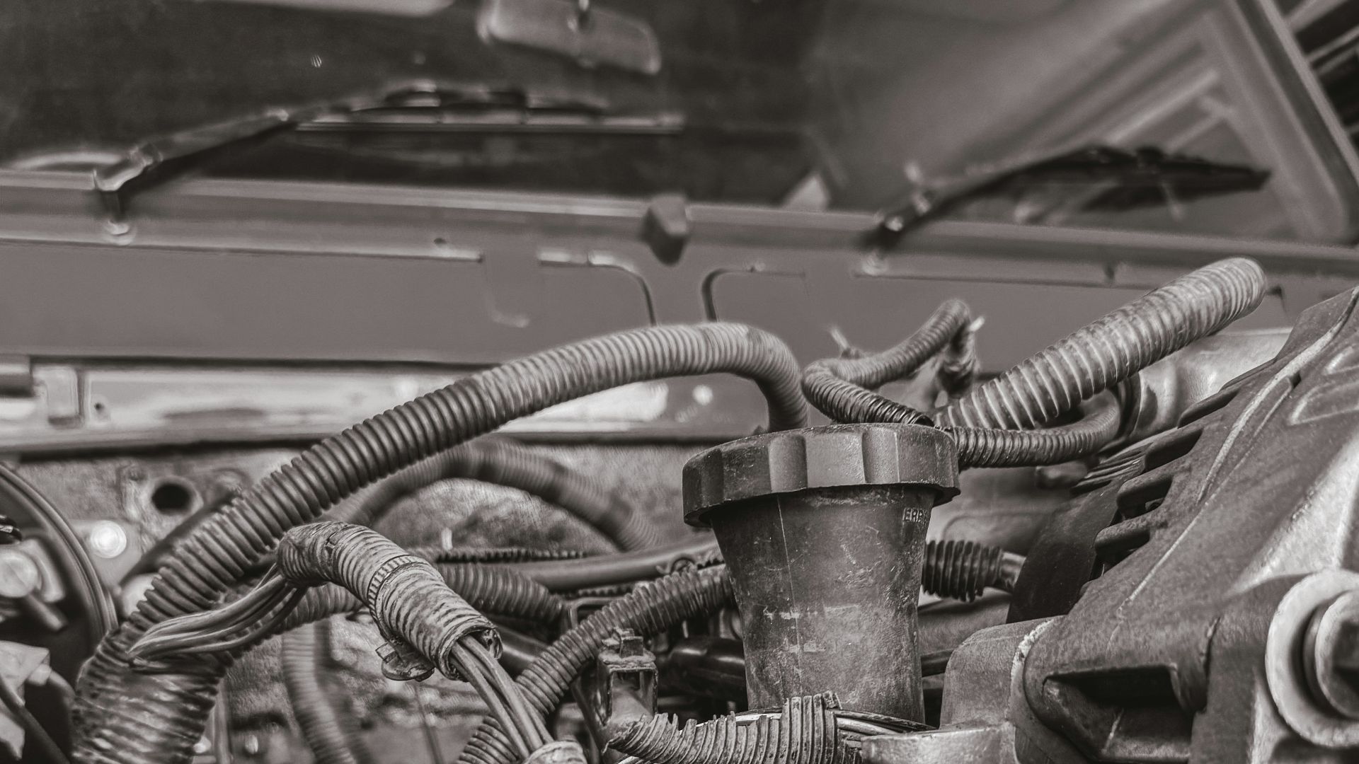 Close-up of a car engine with many wires