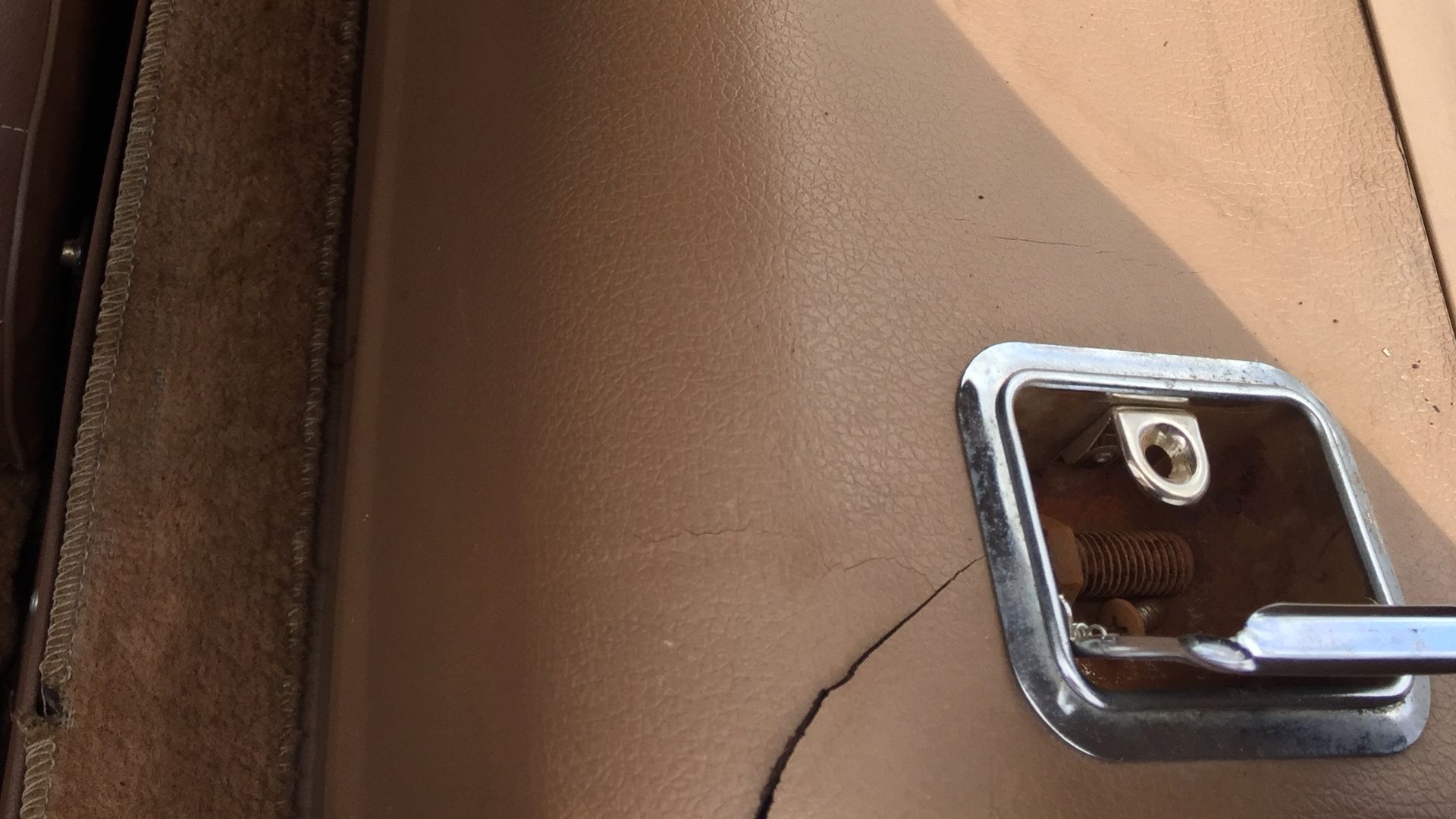 1975 AMC Matador four-door station wagon with room and comfort for eight adult passengers. A large-sized car built by American Motors Corporation (AMC). This car is finished in brown or Cocoa Metallic with a tan interior. It has three rows of seats and th