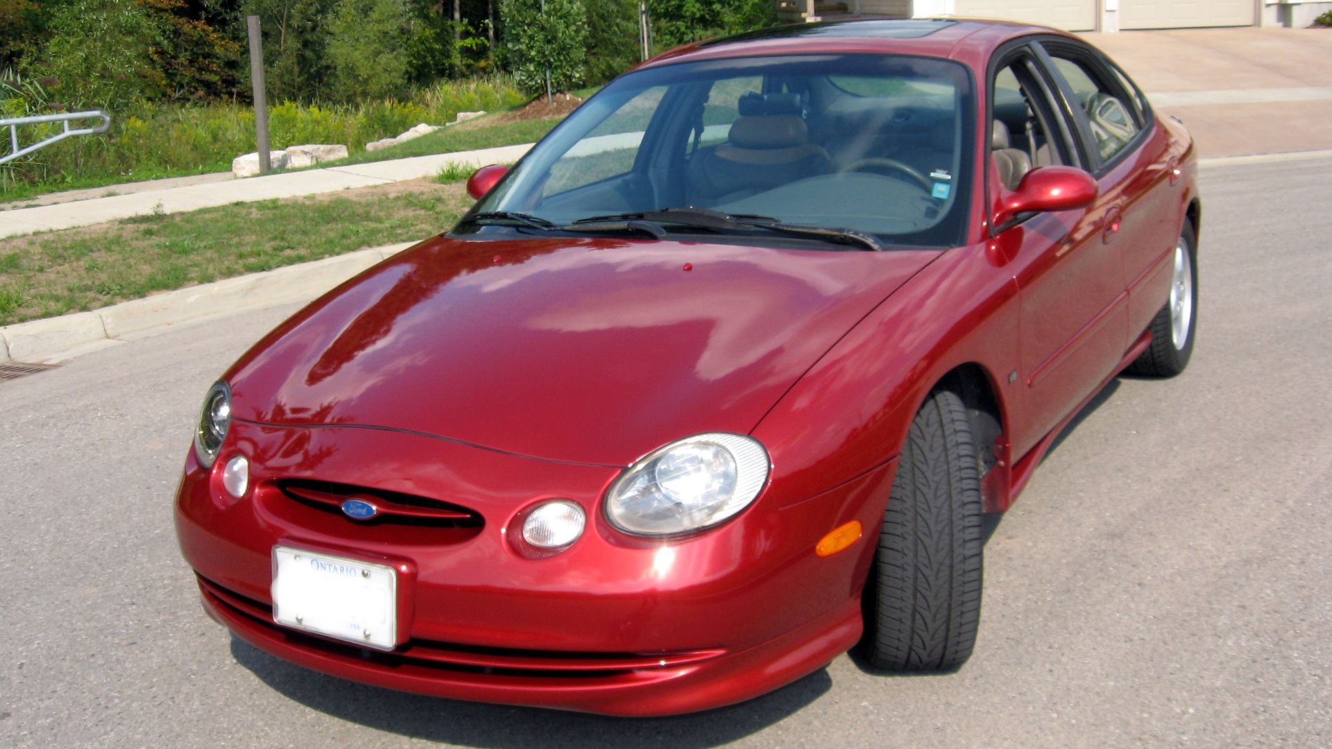 1997 Ford Taurus SHO in Toreador Red. Taken in September 2006.

I am the Author.
