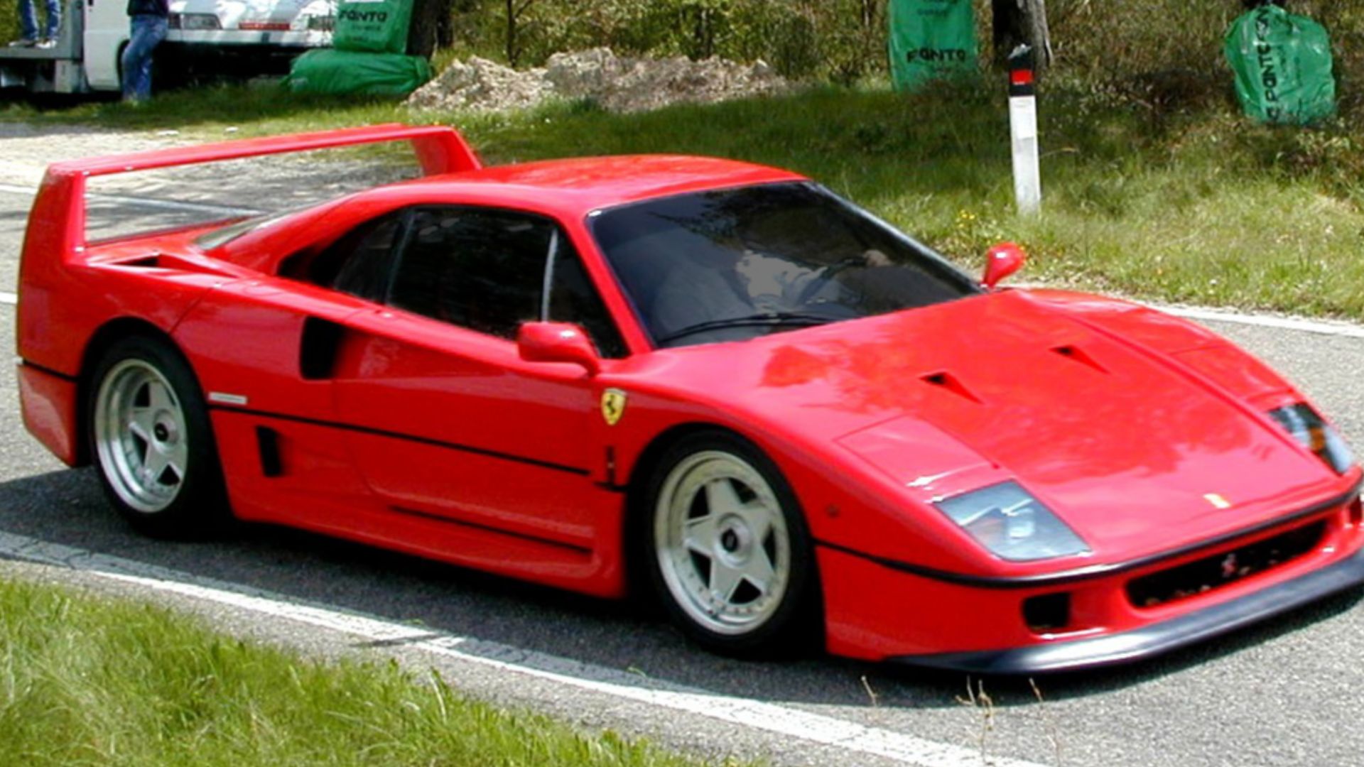 This is a modified version of Image:Ferrari F40.JPG in which I, User:Executioner, using Adobe Photoshop, only tinted the front and side windows of the car.