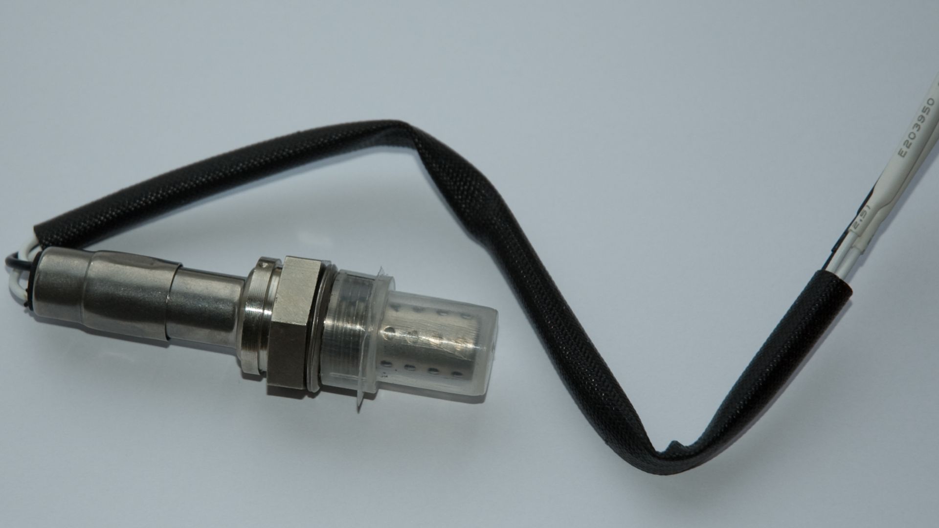 Oxygen sensor spare part for a Volvo 240 car (actually many different types of cars use this particular kind of oxygen sensor).