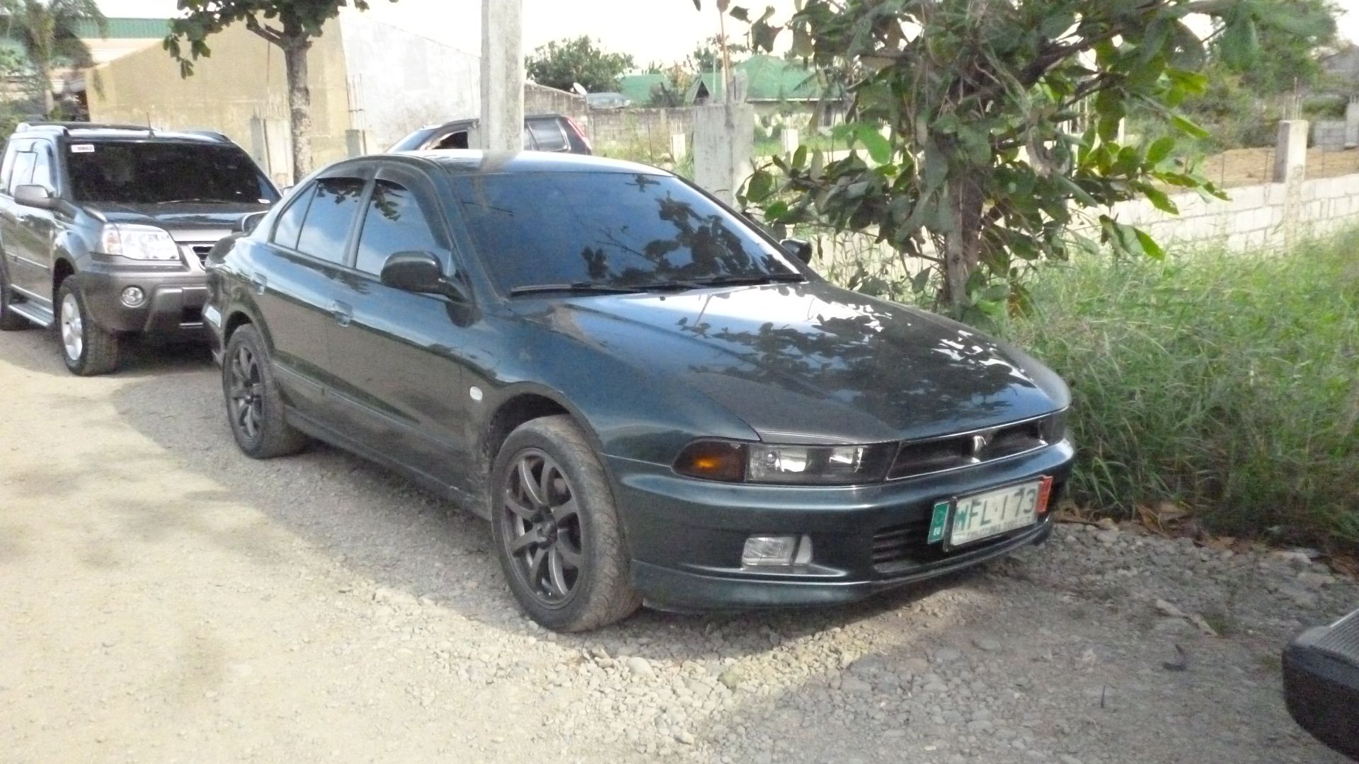 Mitsubishi Galant was parked at Couples For Christ Center. Photo locationː Apolinario H. Mabini Road, Barangay Magsaysay South (Kapalangan), Cabanatuan City, Nueva Ecija 🇵🇭