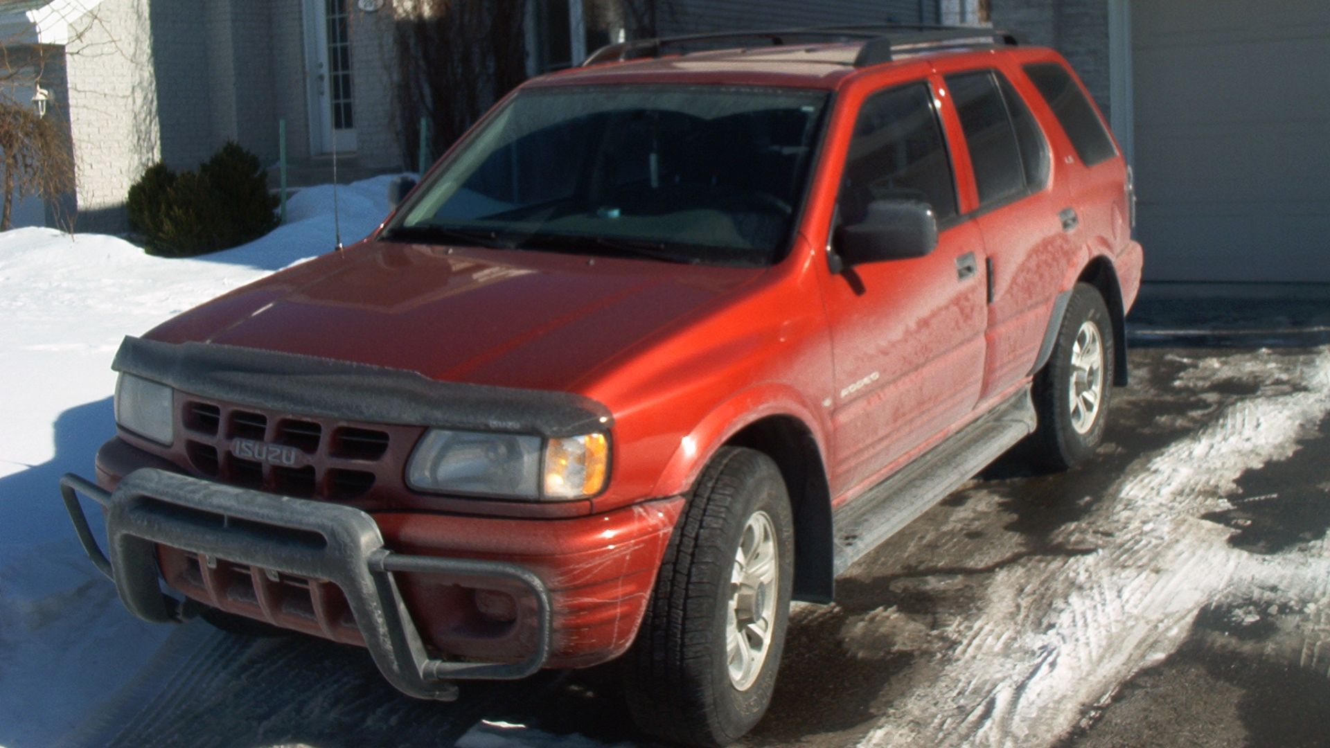 File:Red Isuzu Rodeo.jpg