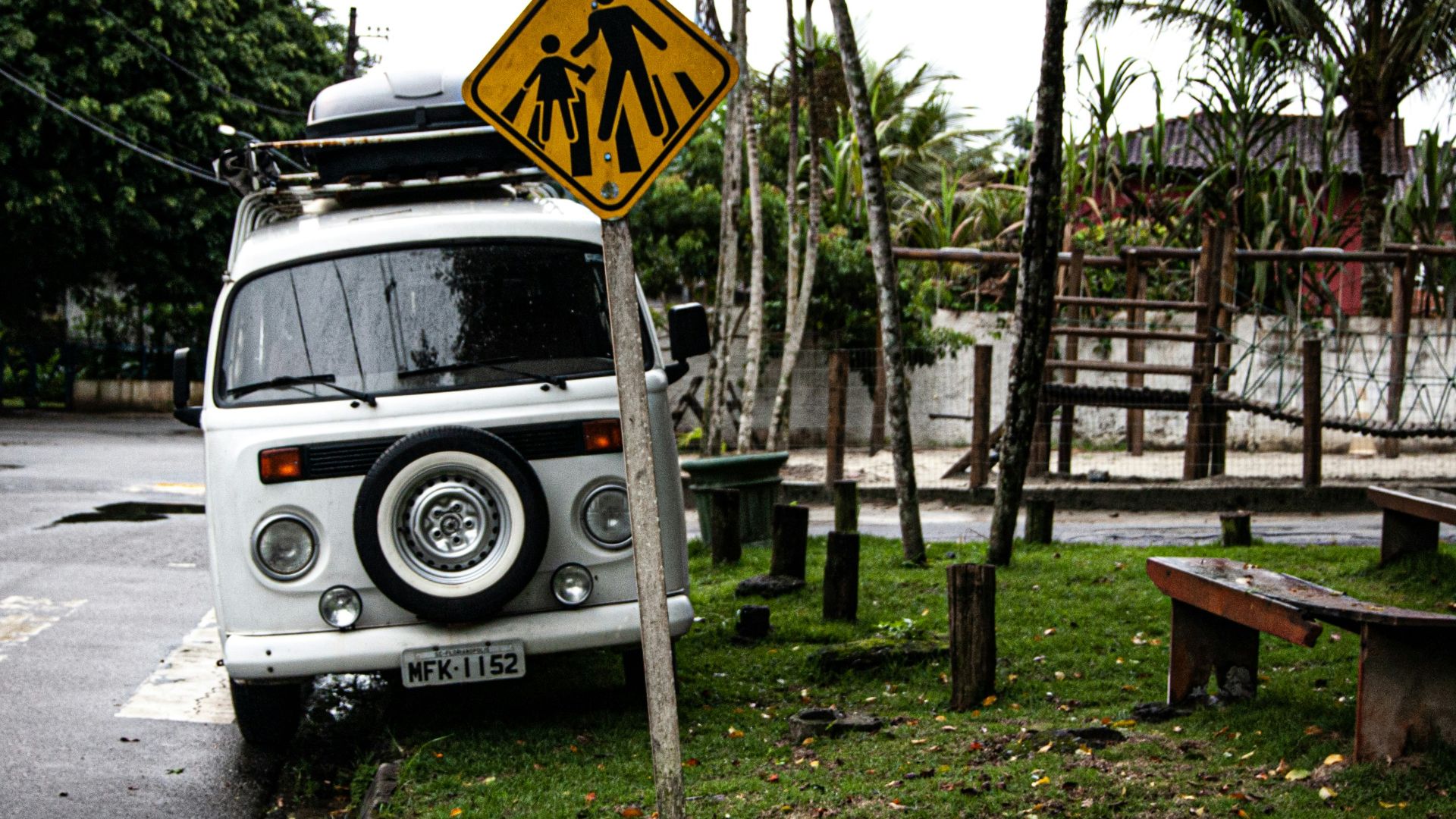 white and black jeep wrangler parked near trees during daytime