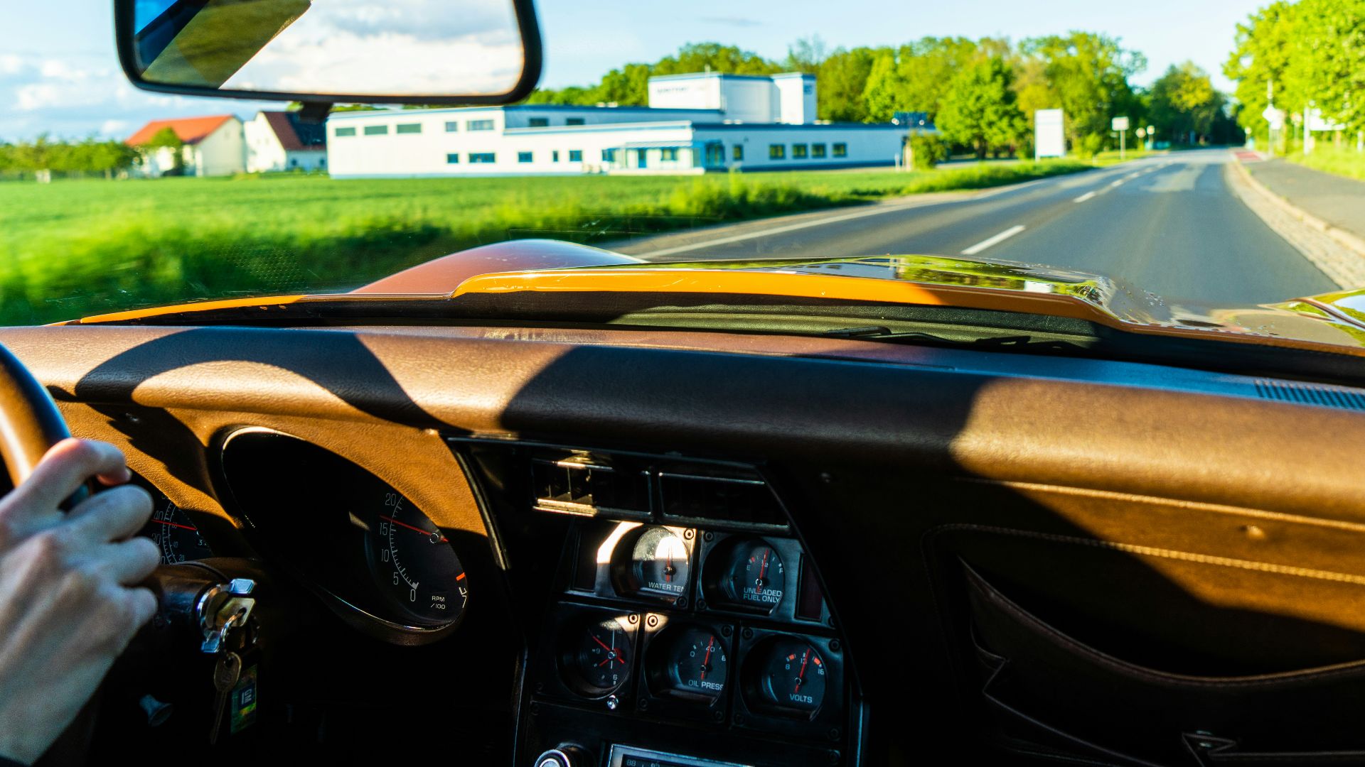black car on road during daytime