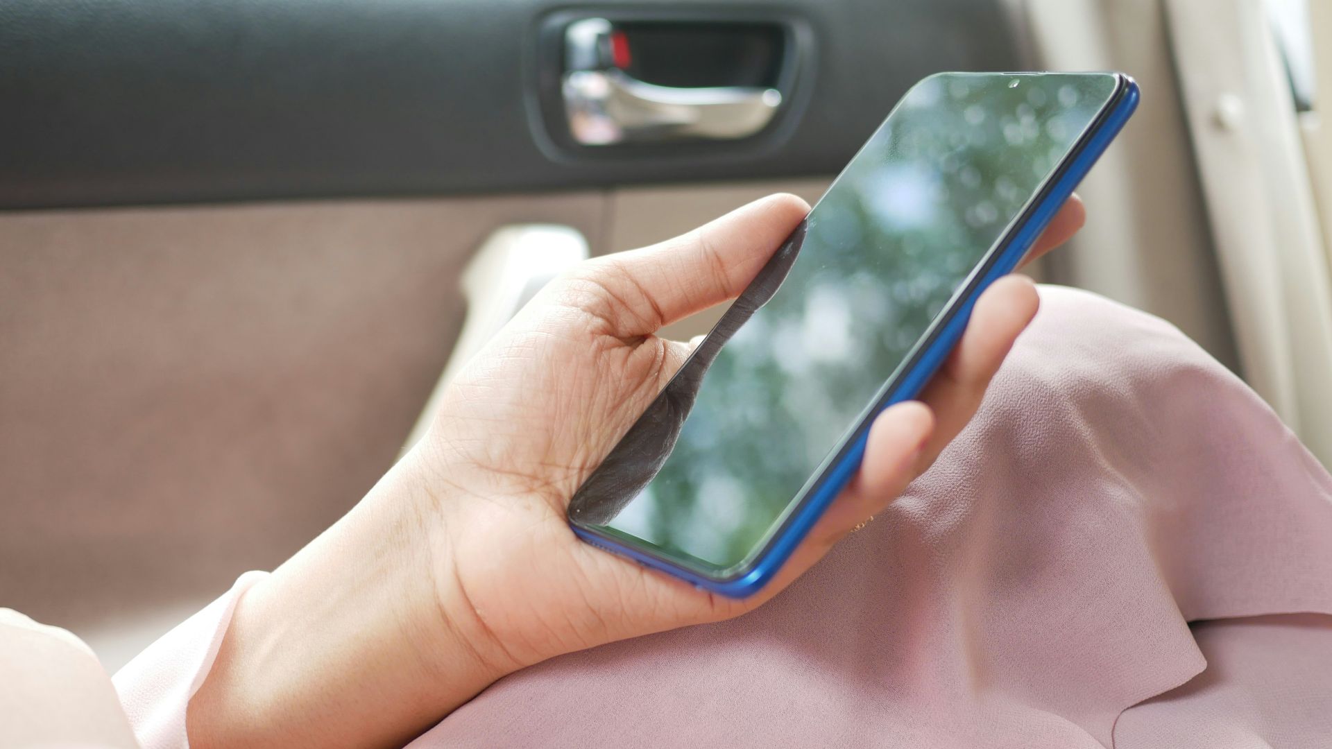 person holding black android smartphone