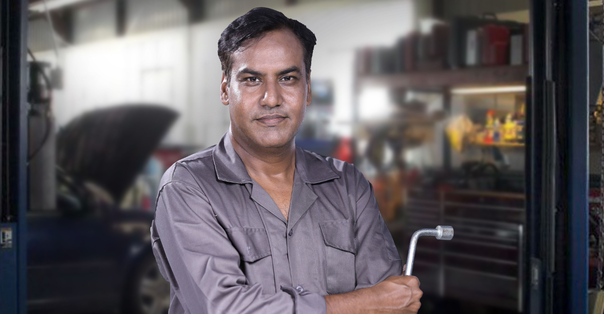 a-mechanic-holding-a-tire-wrench