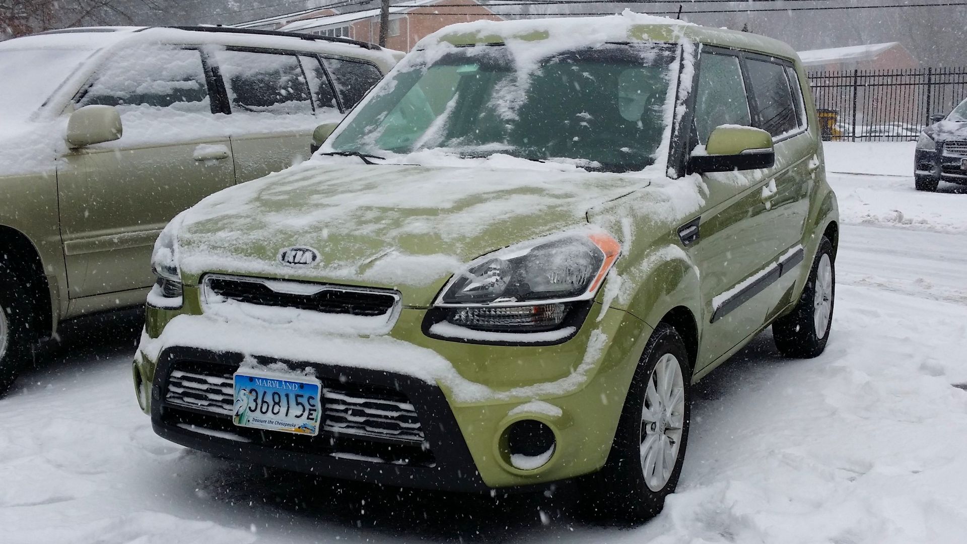 A 2012 Kia Soul after a layer of snow had been cleared from the windshield and hood during the snowstorm that occurred in late January 2014.  This process would be repeated a few times in order to keep ahead of the snow.

Ben Schumin is a professional pho