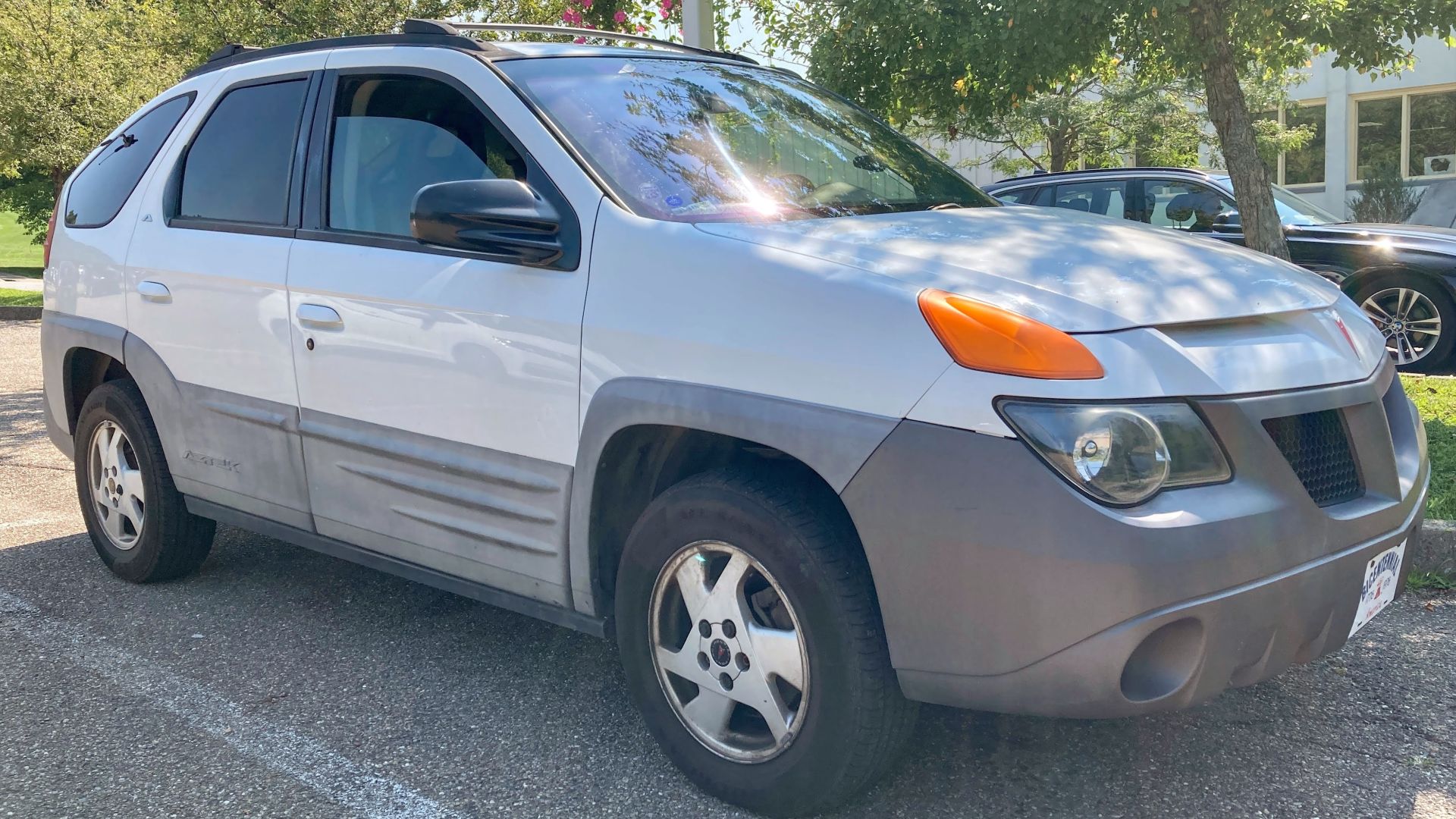 A 2001 Pontiac Aztek in Pewter Metallic, photographed in Wheeling, West Virginia. This Aztek is equipped with the 3.4L V6 engine and assembled in Ramoz Arizpe, Mexico. This is an AWD-trim Aztek. 2001 models are the rarest of all model years and have plast