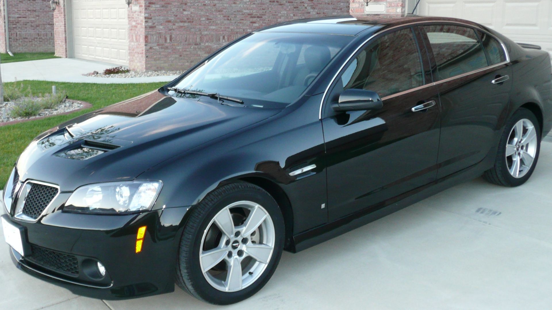 2009 Pontiac G8 GT sedan in Panther Black Metallic, photographed in North America.
