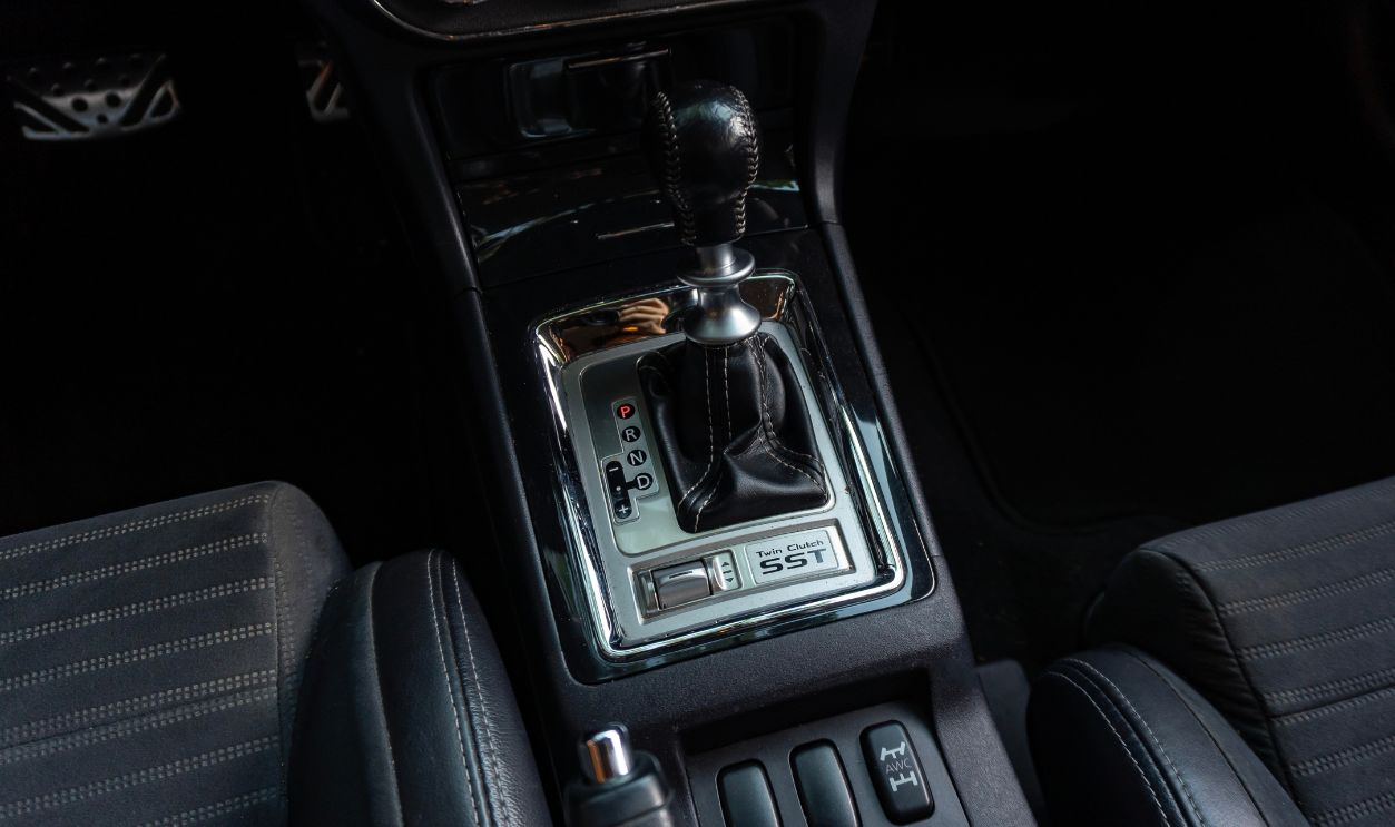 Minas Gerais, Brazil - 01 10 2025: Lancer Evolution X SST dual-clutch transmission shifter, Japanese sports sedan automatic gearbox and AWD controls