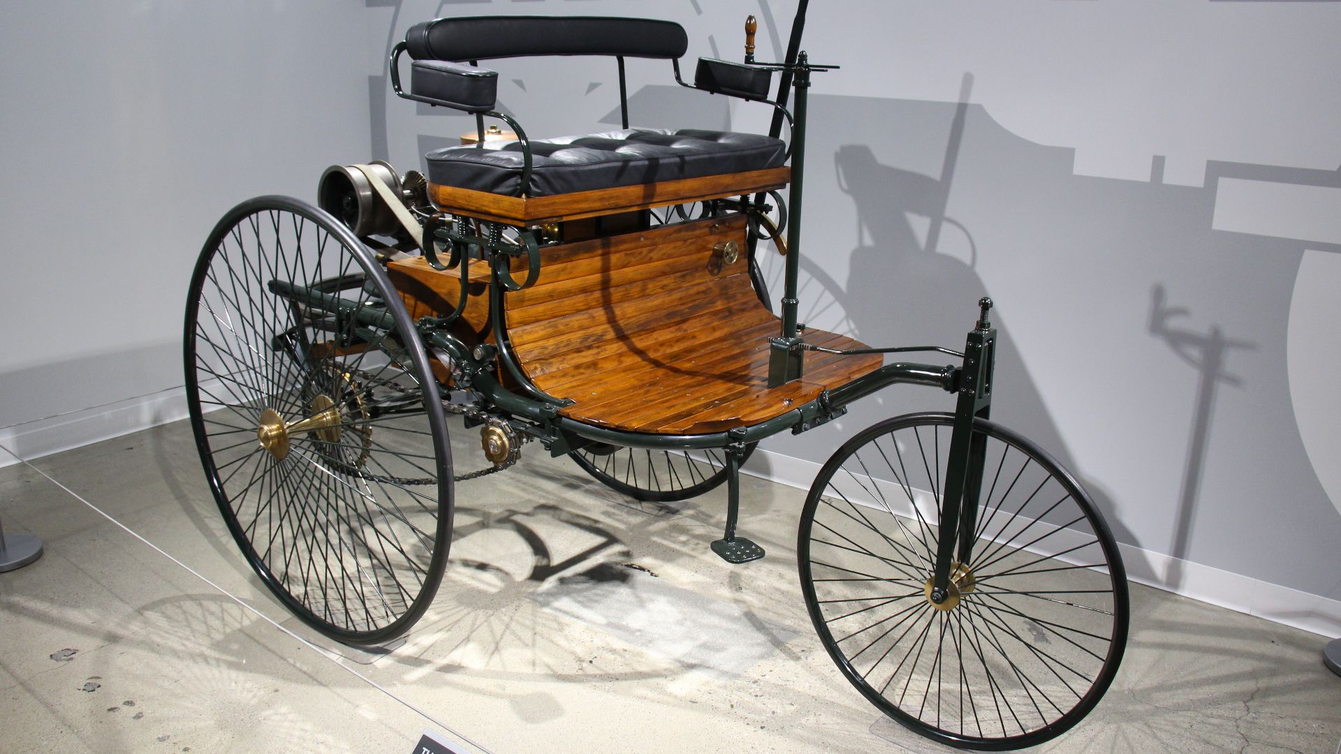 Karl Benz's Patent Motorwagen is regarded as the first practical self propelled vehicle. Powered by a 4 stroke internal combustion engine and had 3 spoke wheels on rubber tyres. though primitive by todays standards, the two passenger Motorwagen contained