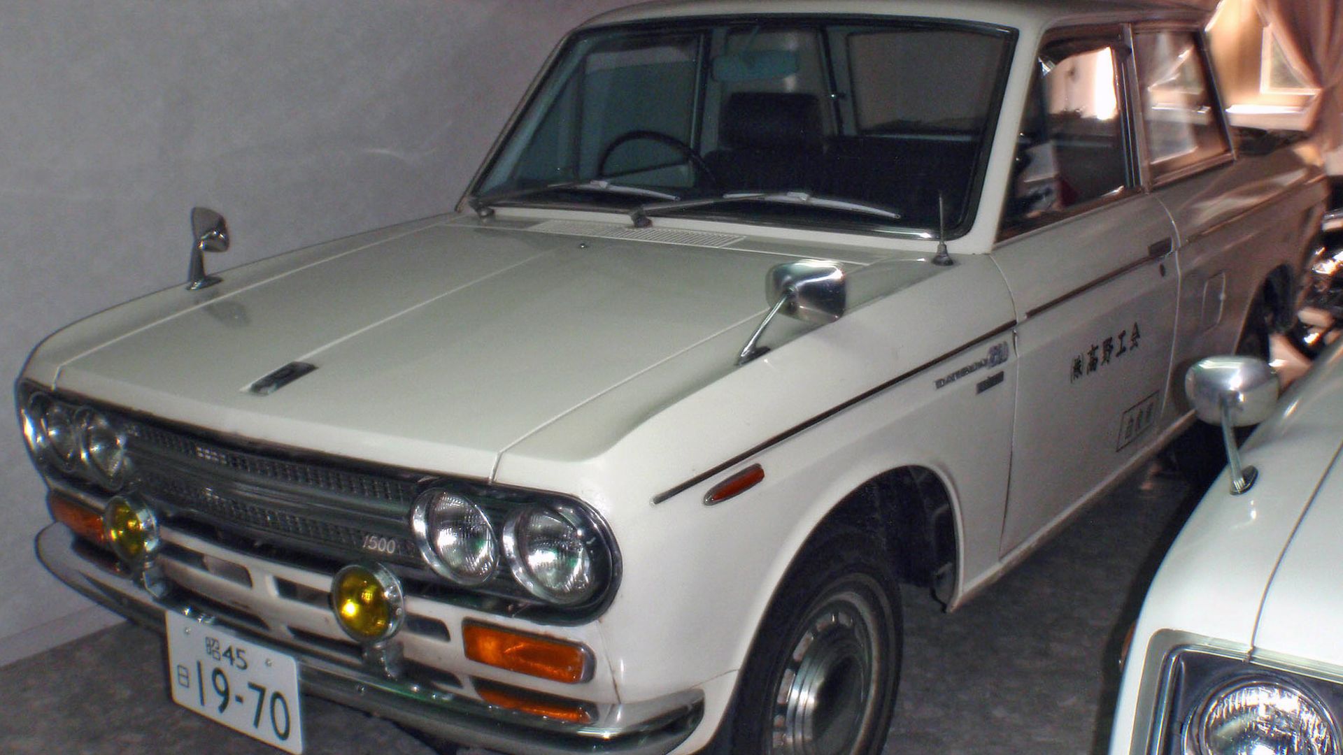 1970 Datsun 1500 Double-Cab Truck (U521) at the Motorcar Museum of Japan. In classic Japanese period style, only the driver gets a headrest.