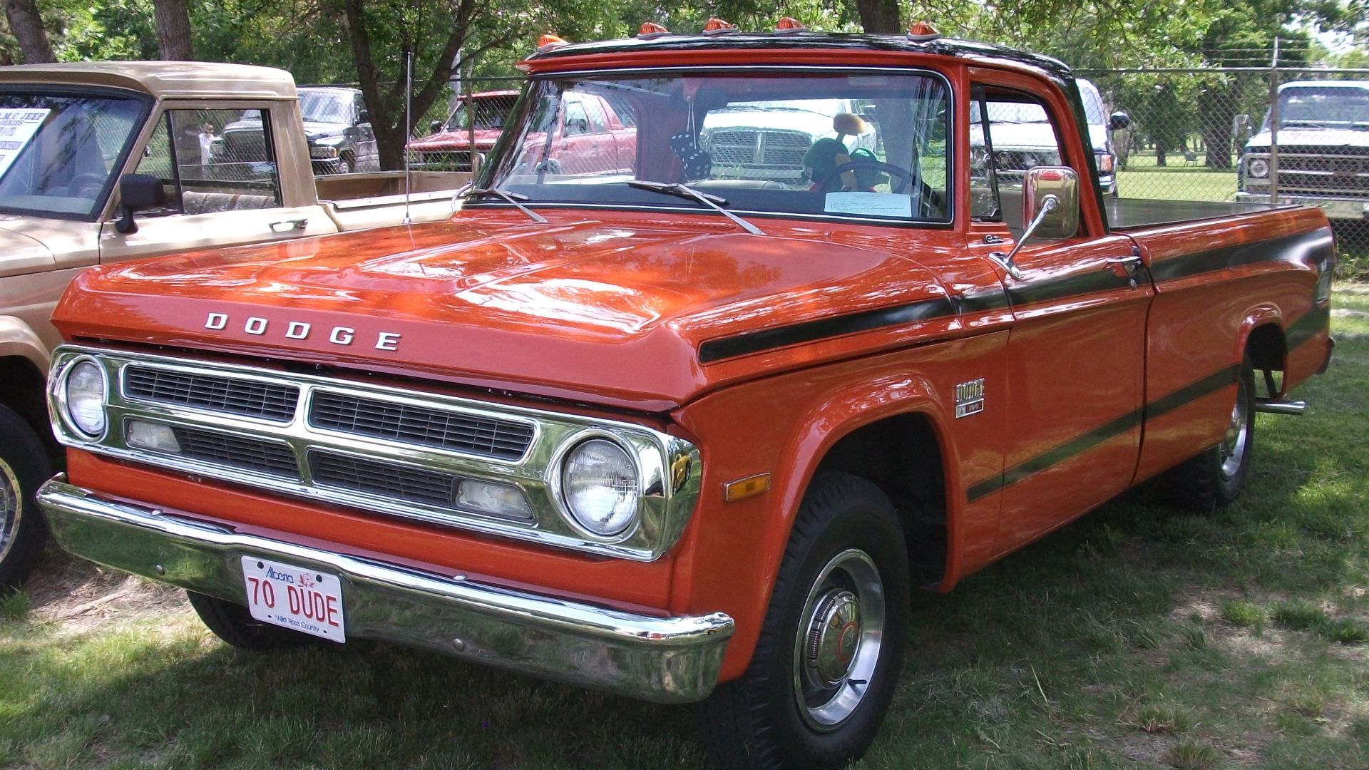 1970 Dodge The Dude - The Dude was an optional package available on Dodge trucks. Featured a cowboy hat logo and distinctive C shape stripe. Only 1500-2000 where made between 1970 and 1971.