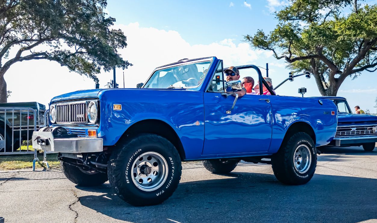 Shutterstock - 2503773763 - Low perspective front corner view of a 1975 International Harvester Scout II Pickup at a local car show.