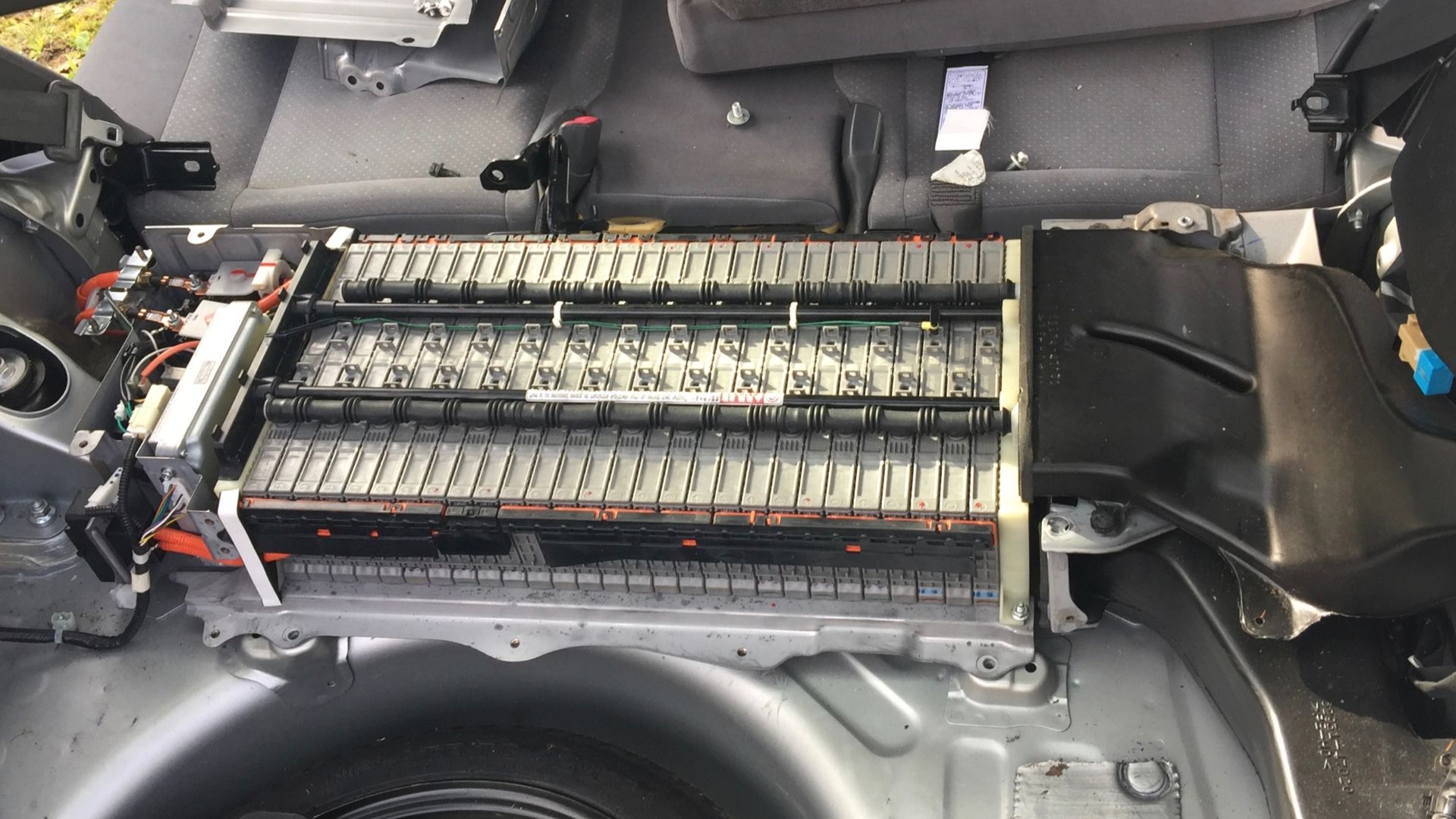 Reinstallation of 2005 Prius Hybrid battery after replacement of several failed modules that caused the red