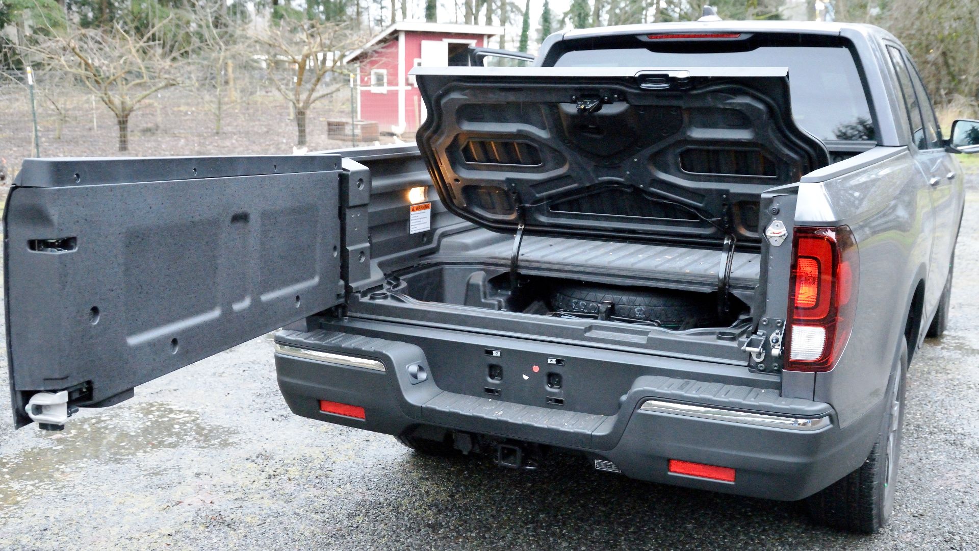 The 2017 Honda Ridgeline RTL dual-action tailgate and in-bed trunk