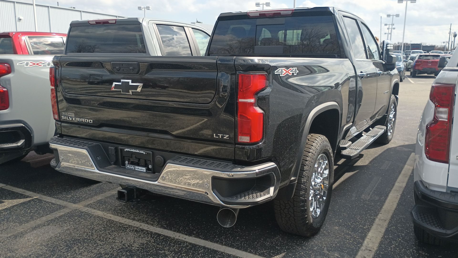 Rear view of a 2024 Chevrolet Silverado 2500HD LTZ Crew Cab heavy duty pickup truck.