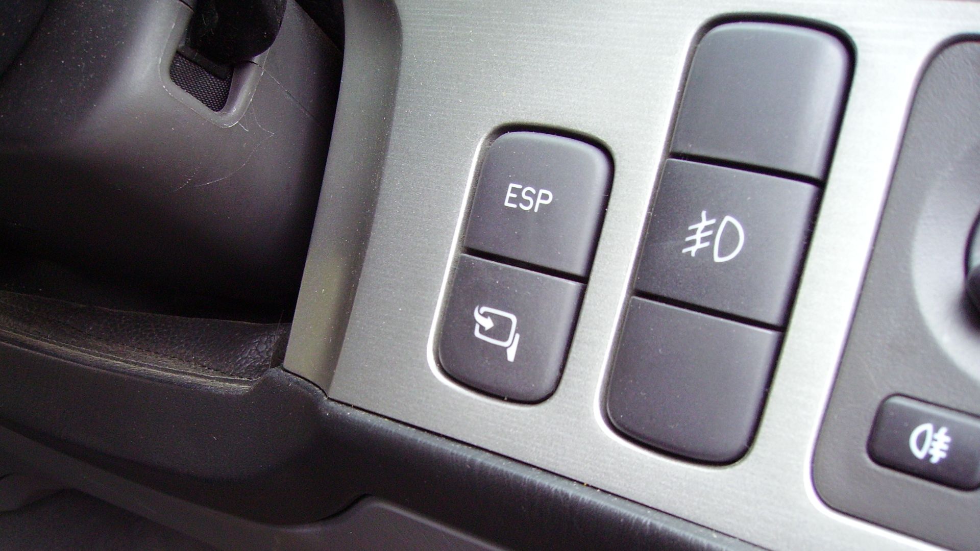 Side-view mirror retraction control (Saab 9-5)