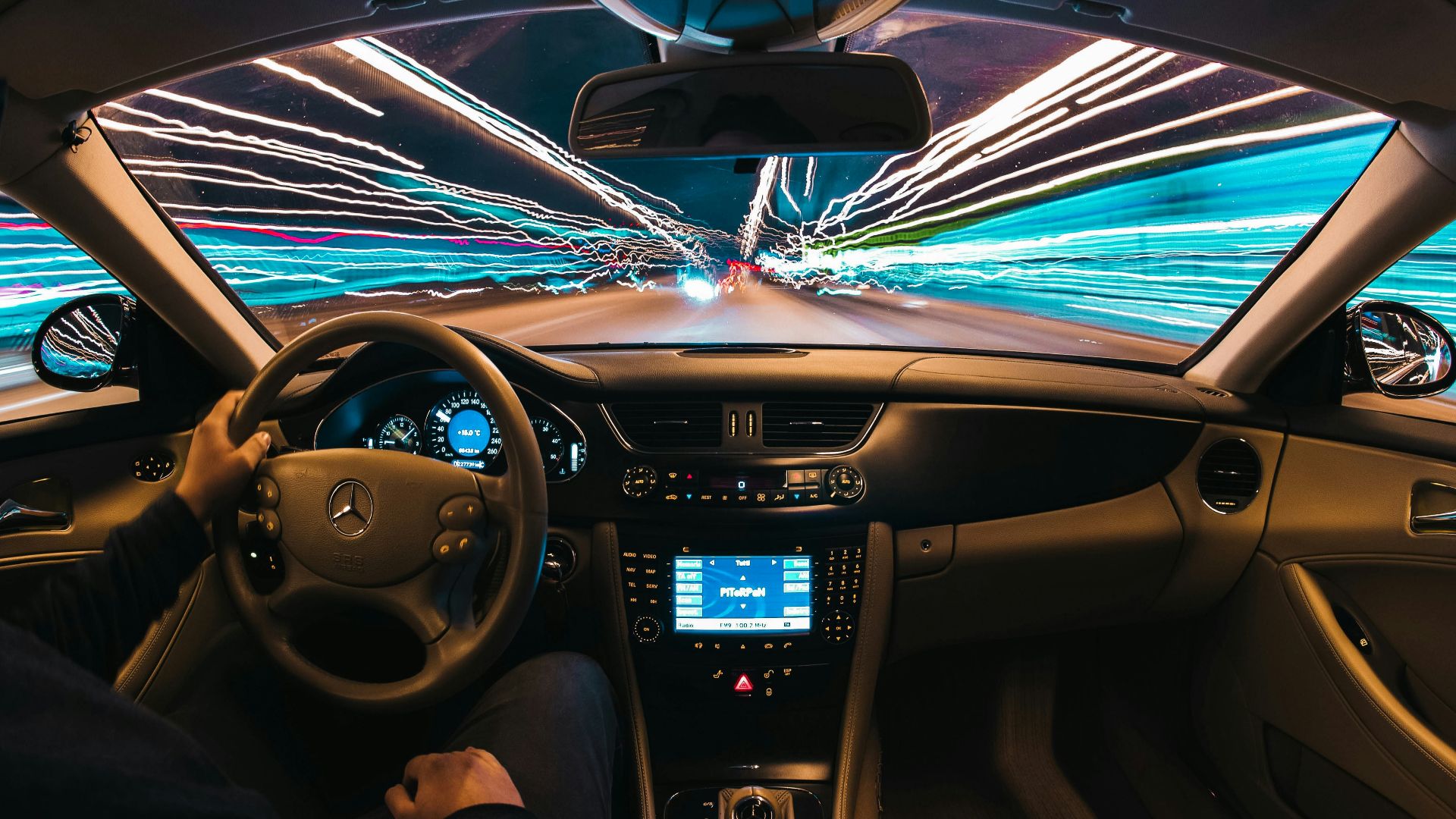 time lapse photography of man riding car