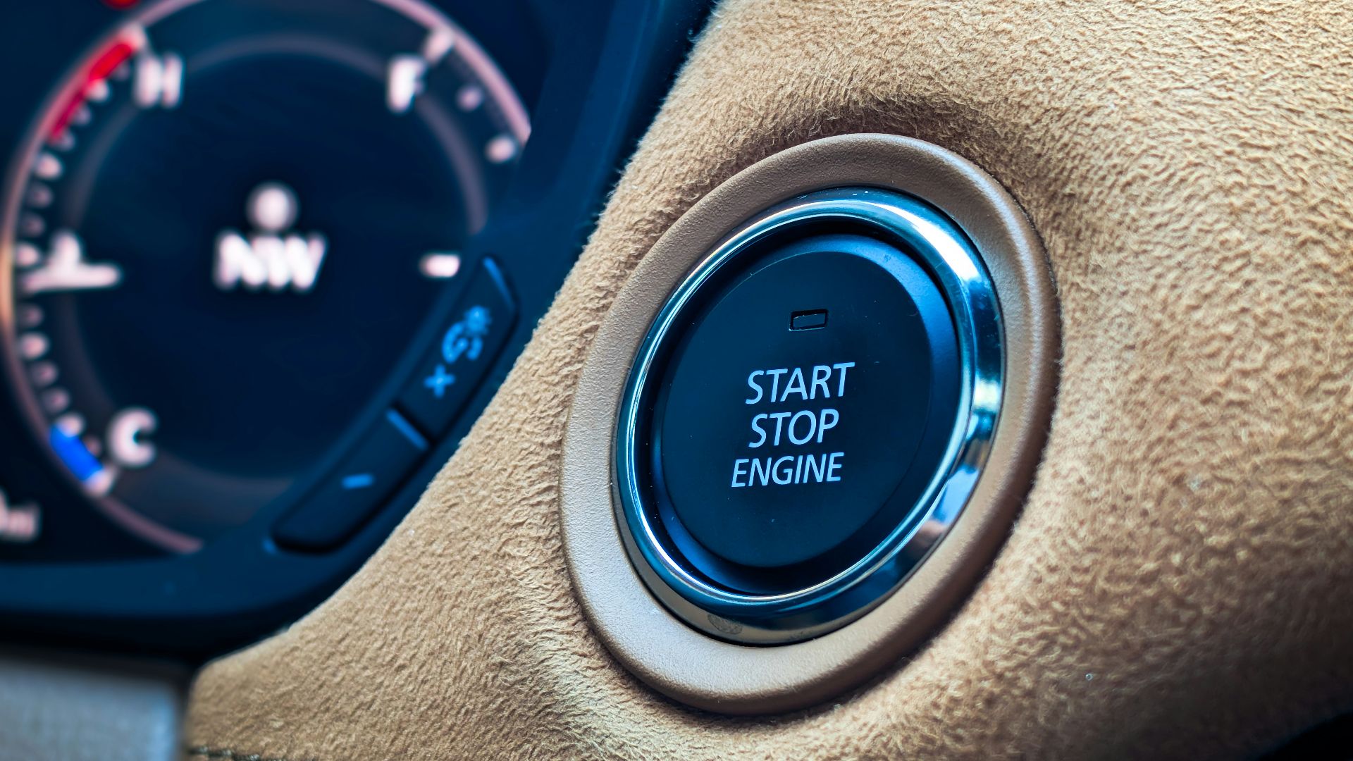 Start stop engine button in a car interior