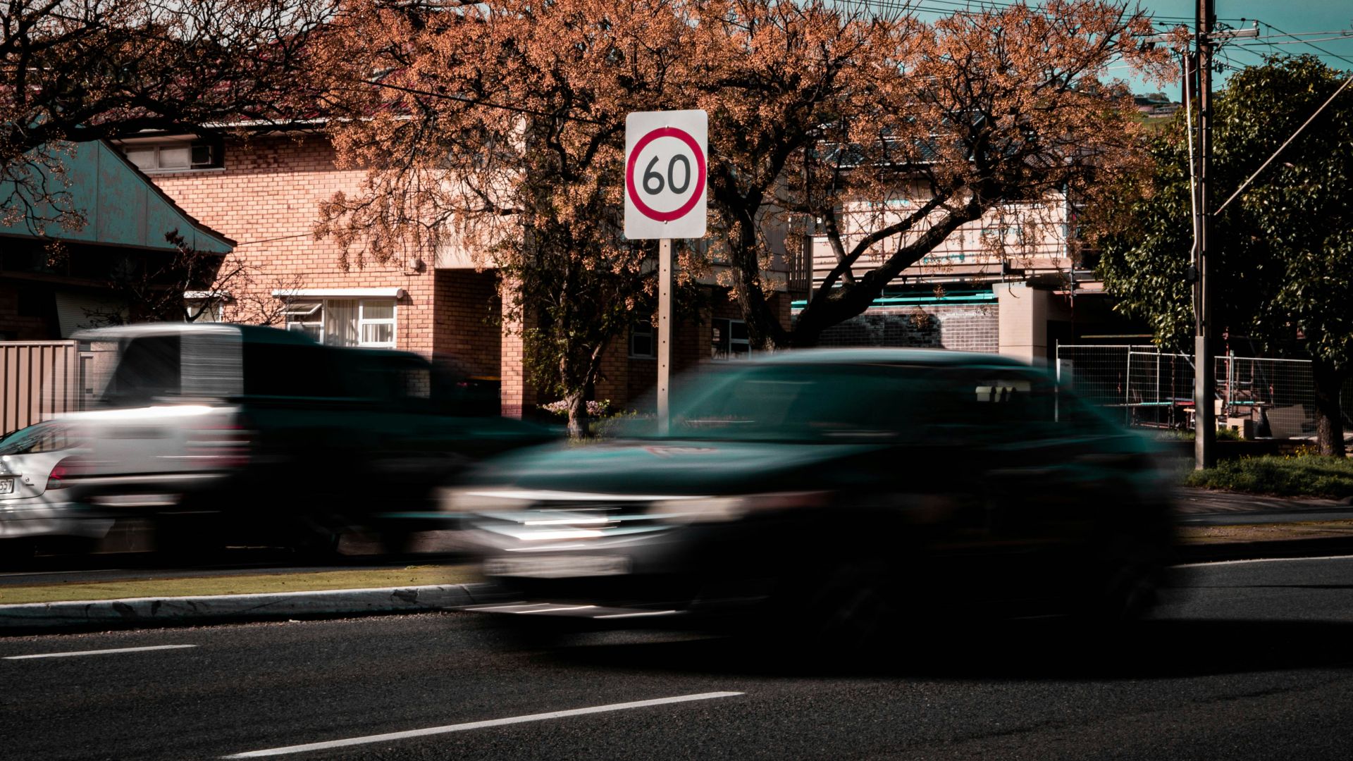 time lapse photo of car on road
