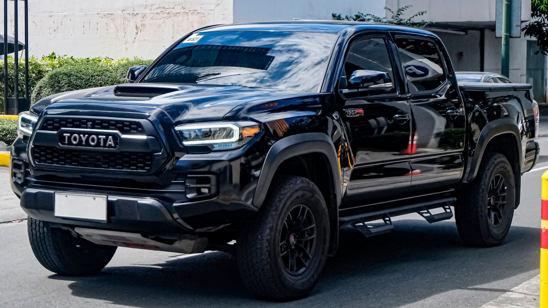 Midnight Black Metallic Toyota Tacoma GRN305L FL 3.5 TRD Pro. US-spec gray import.