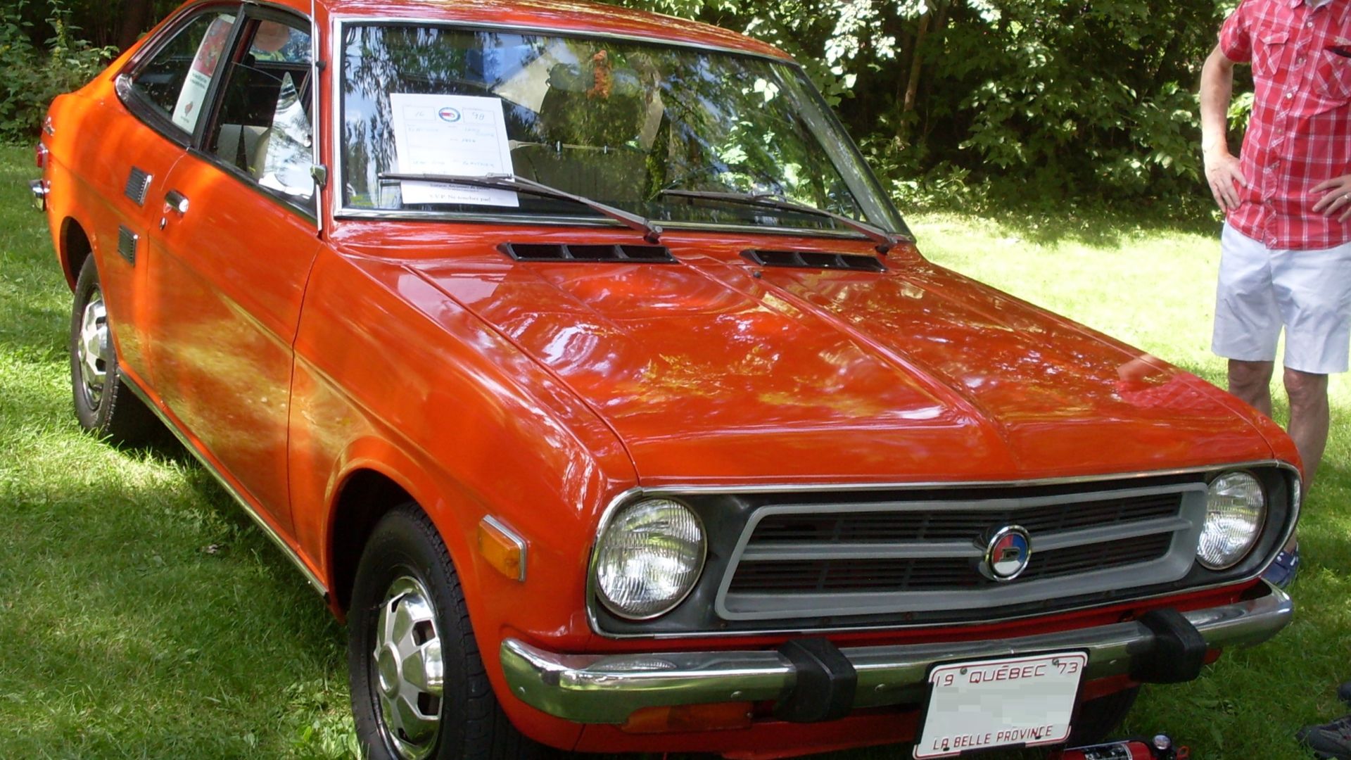 1973 Datsun 1200 photographed in Beaconsfield, Quebec, Canada at Auto classique VAQ Beacosnfield 2013.