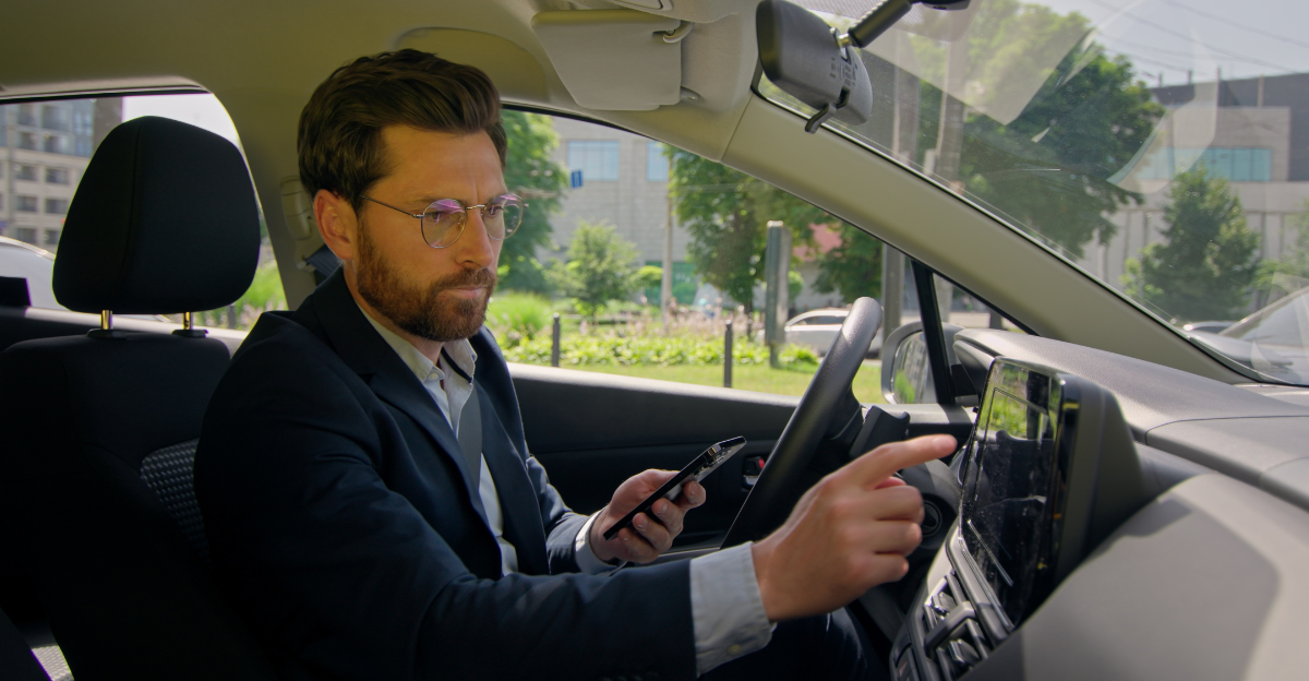 Business man inside modern electric car travel 