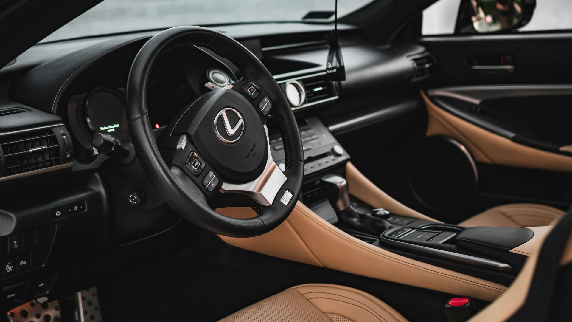 black and brown bmw steering wheel