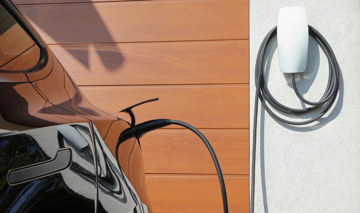 Ostrava, Czech Republic, 08 30 2024: Charging an electric car from a Tesla home wallbox.
