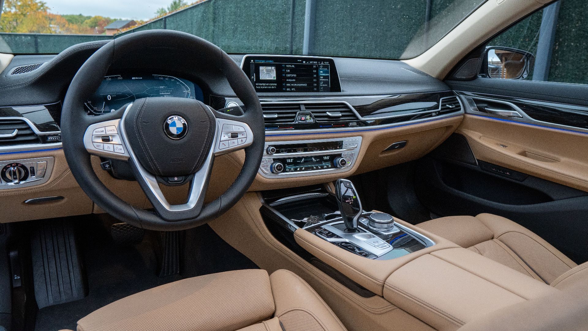 Explore the modern luxury car interior featuring sleek design and advanced technology.