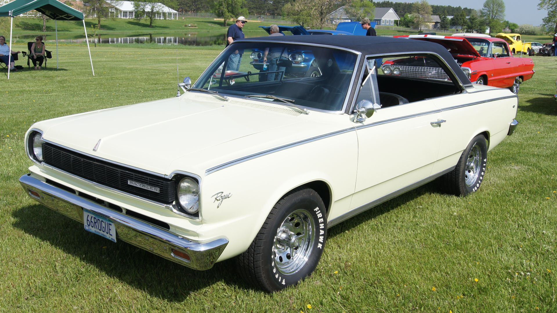 1966 Rambler American Rogue 2-door hardtop. A compact made by American Motors Corporation. This is the special mid-year introduction of AMC's new 290 CID (5.0 L) V8 engine. Note: this car has aftermarket wheels. 
40th ANNUAL GREENBERG MEMORIAL DAY CAR SHO
