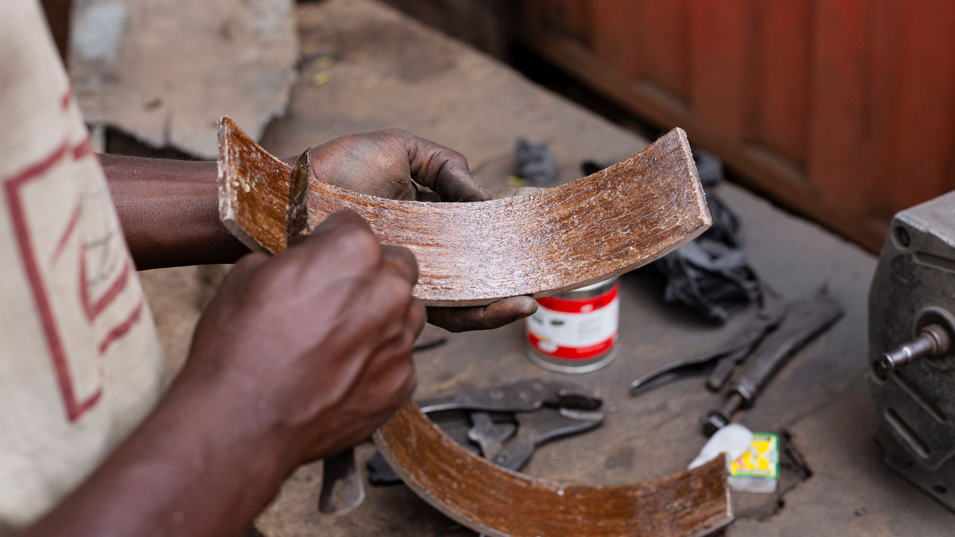 Mechanic working on a brake band