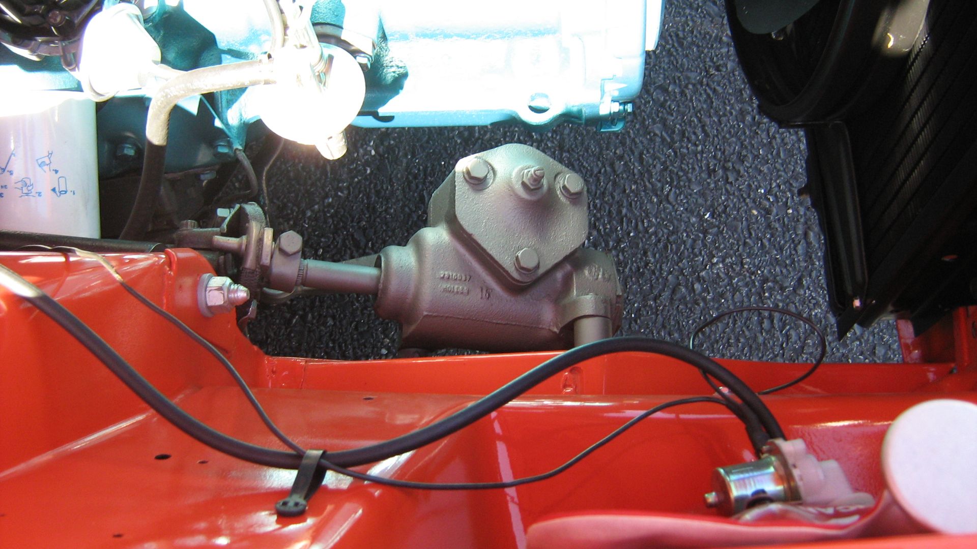 Steering box is on the right side of the car. 1971 AMI Rambler Gremlin assembled in Australia by Australian Motor Industries (AMI). The automobile is from a complete knock down (CKD) kit from American Motors Corporation (AMC).