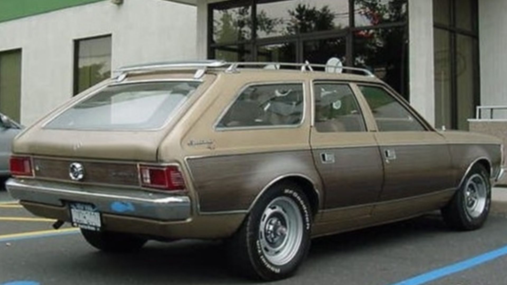 1972 American Motors Corporation (AMC) Hornet Sportabout - four door station wagon - with optional wood-grain body side trim and AMC's styled steel road wheels. This picture was taken at the 2003 AMCRC show held in Somerset, New Jersey. This car was parke