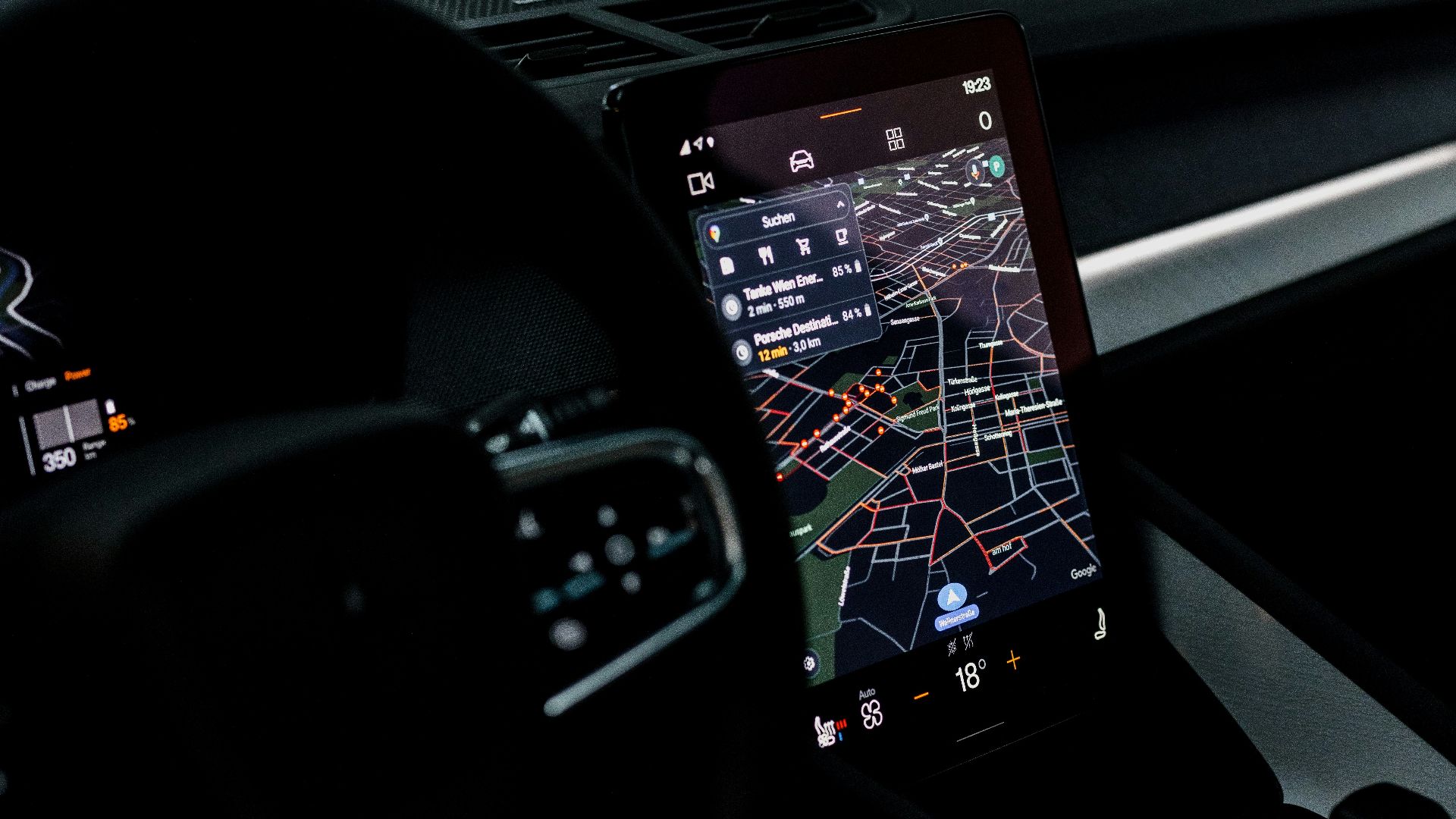 the dashboard of a car with a gps device