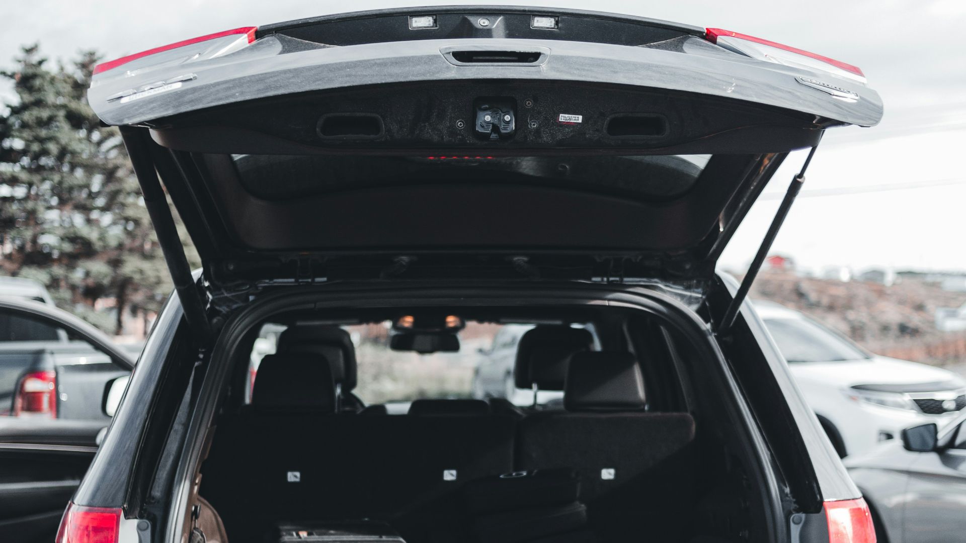 the back end of a car with its trunk open