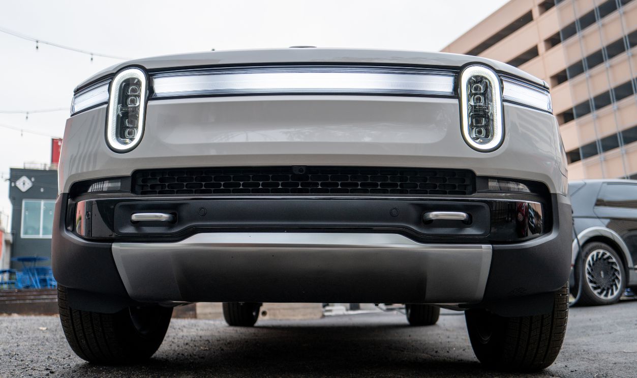 AUSTIN, TEXAS - JANUARY 08: A Rivian vehicle is displayed on a lot on January 08, 2026 in Austin, Texas. Rivian Automotive has issued a recall for nearly 20,000 of its vehicles over an improperly assembled rear toe link according to the U.S. National Highway Traffic Safety Administration.