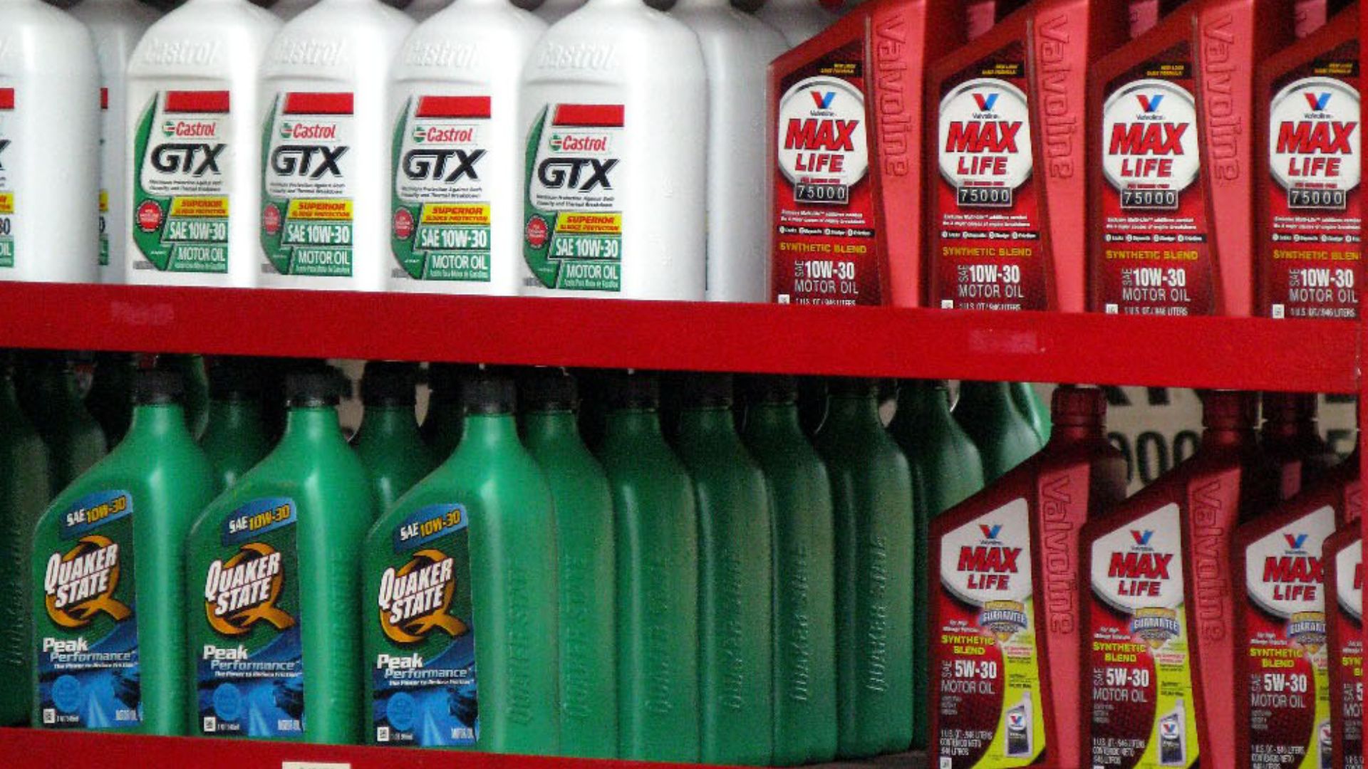 Several brands motor oil bottles.