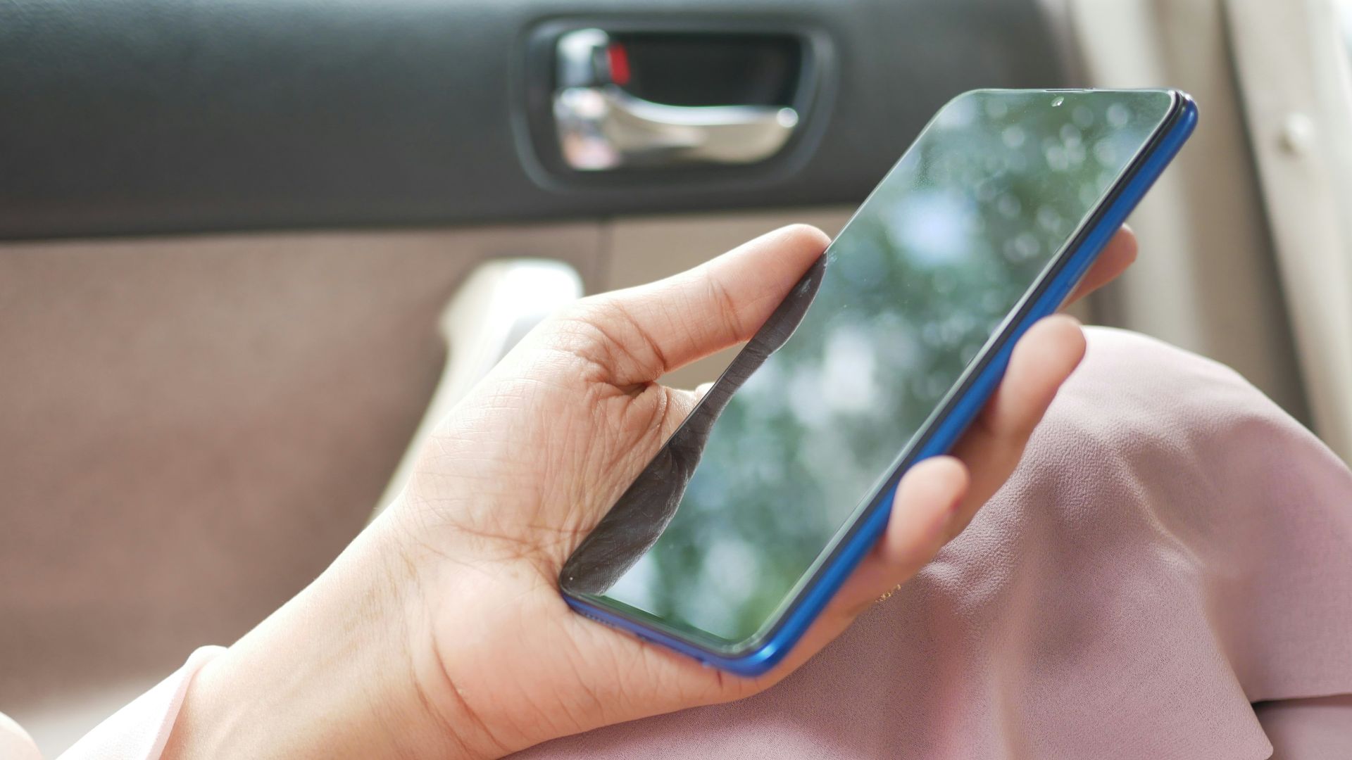 person holding black android smartphone