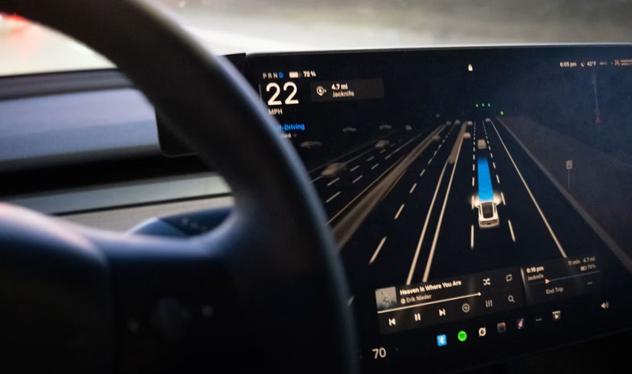 Car dashboard displaying autonomous driving interface