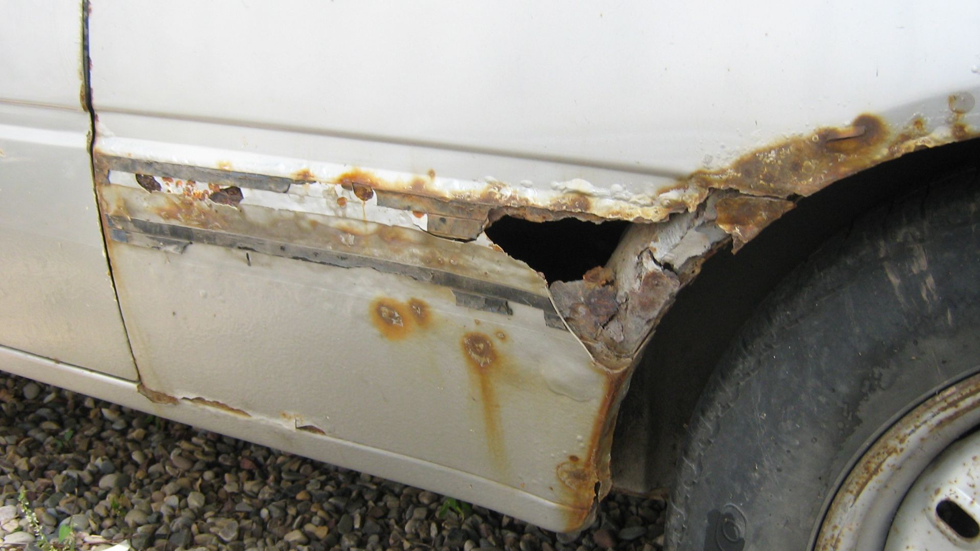 Rust hole before repair