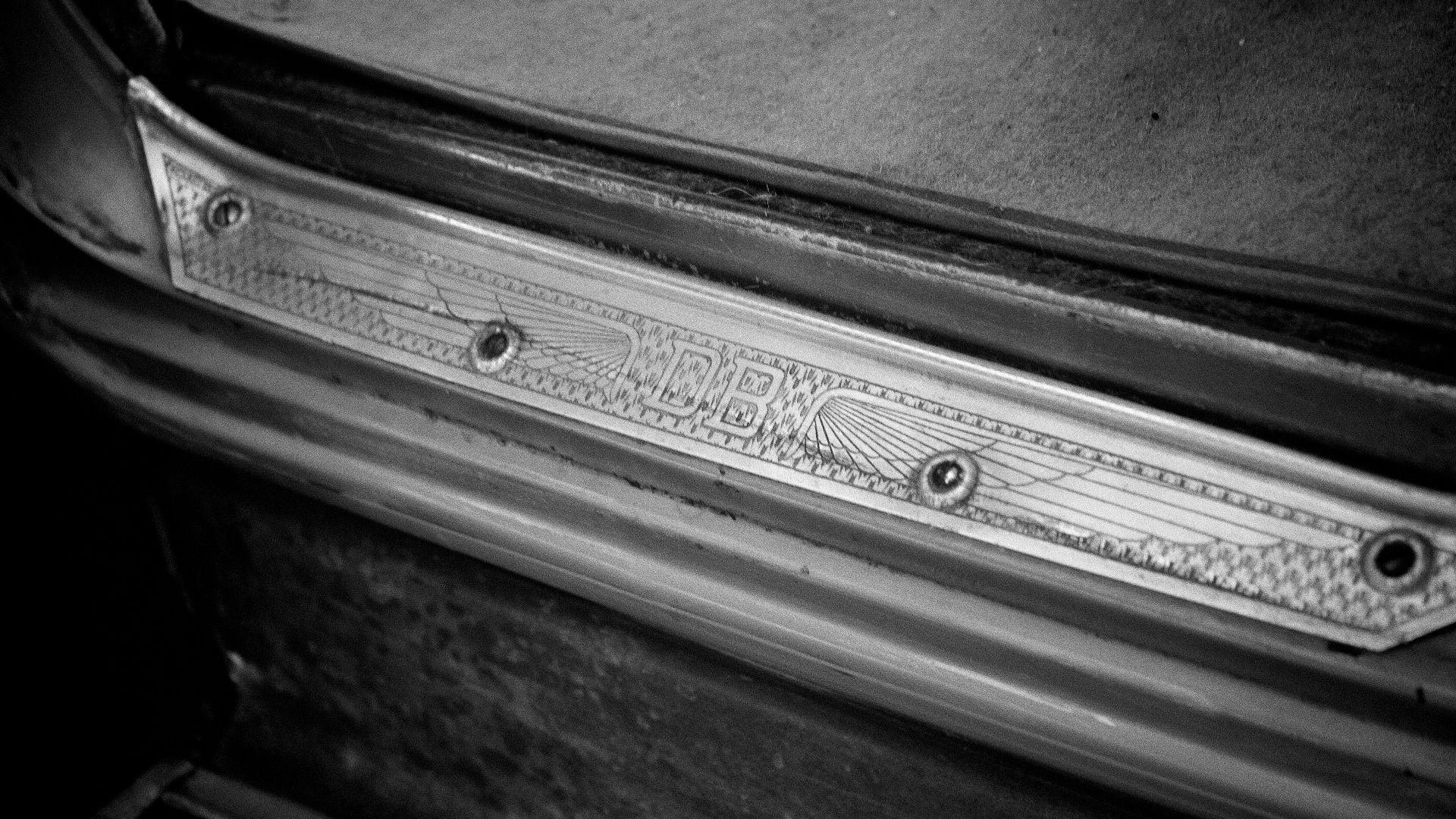 Close-up of vintage car door sill trim detail