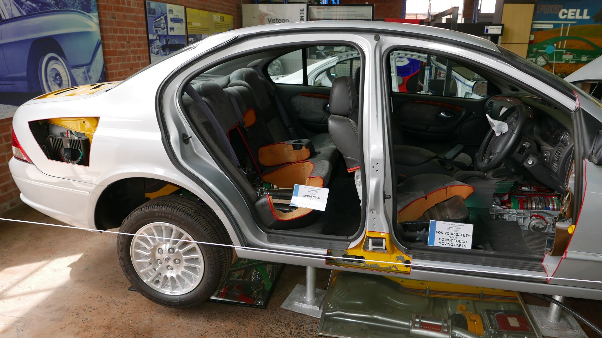 Cutaway of a 1998 Ford Fairmont (AU) Ghia sedan, revealing the interior. Photographed at the Geelong Museum of Motoring and Industry, North Geelong, Victoria, Australia. This cutaway was made by Ford Australia apprentices in 1998. The car has been cutaway