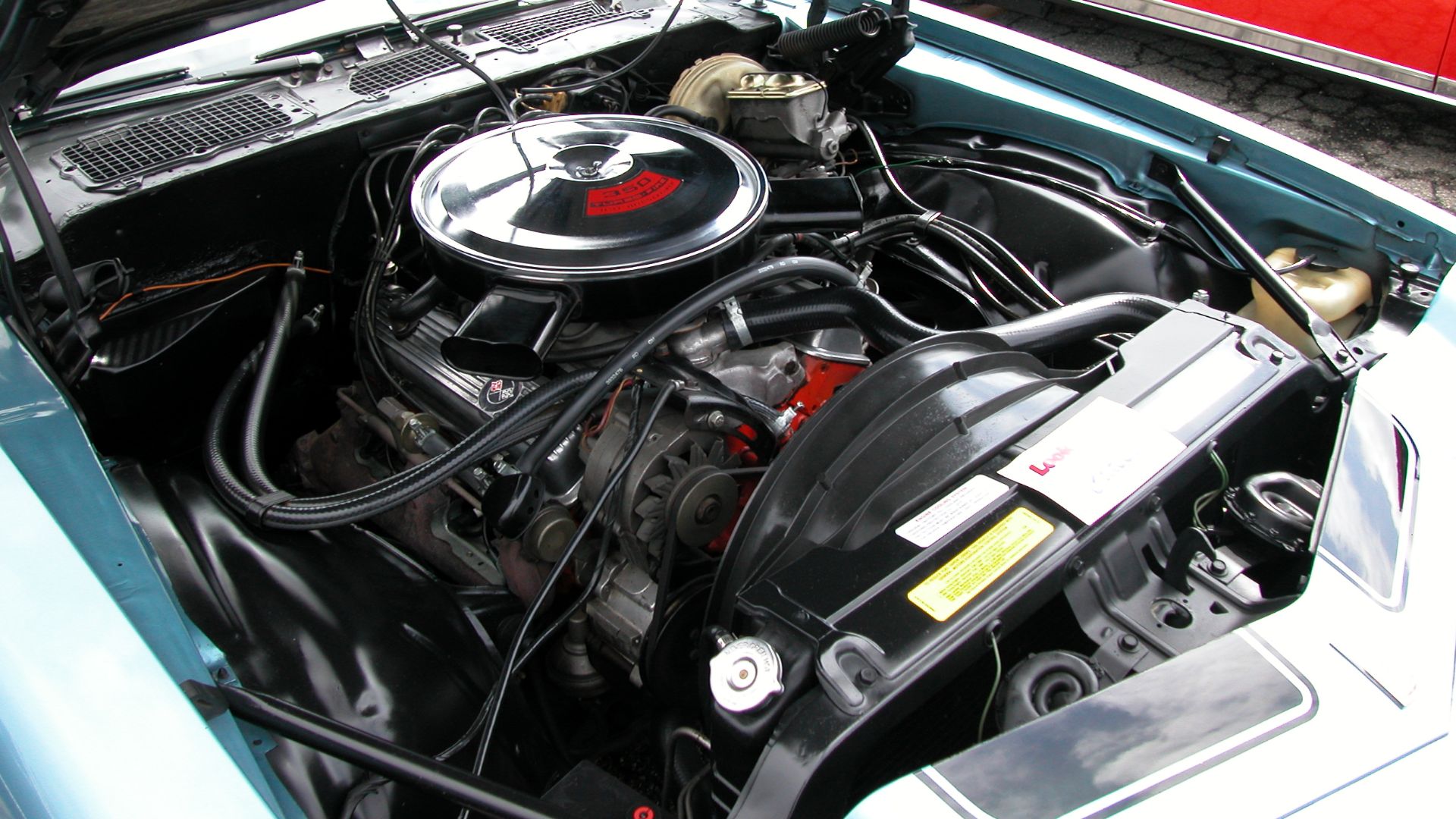 350 cubic in V8 engine from GM. This is from a 1970 Chevrolet Camaro Z28 RS. Camera used was a Nikon Coolpix 5000.