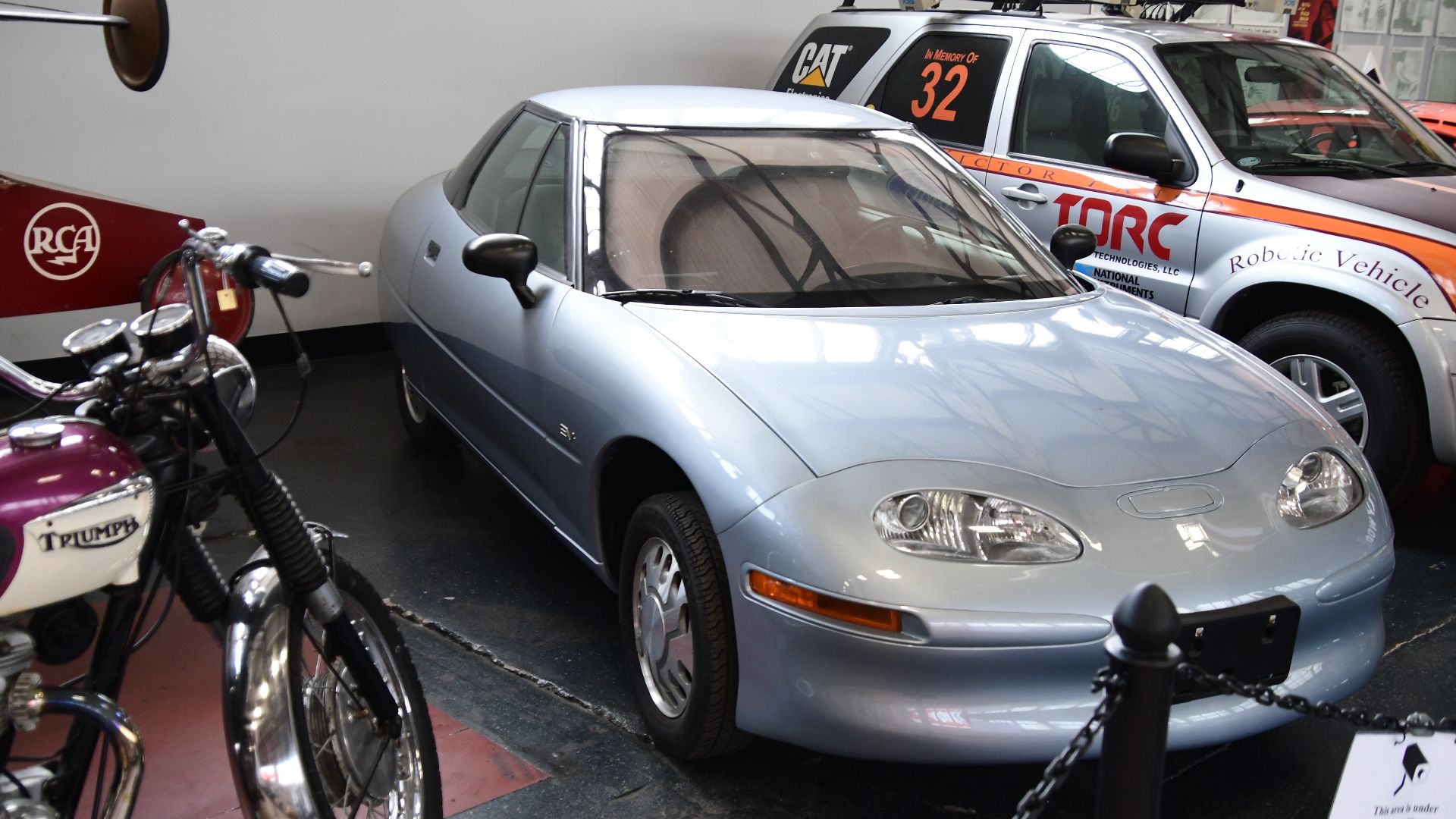 This GM EV1 electric car was part of a grand experiment by General Motors into the feasibility of electric vehicles.  It was the first modern electric vehicle designed by a major manufacturer.  The program ended in 2002, with most of the EV1 vehicles crus